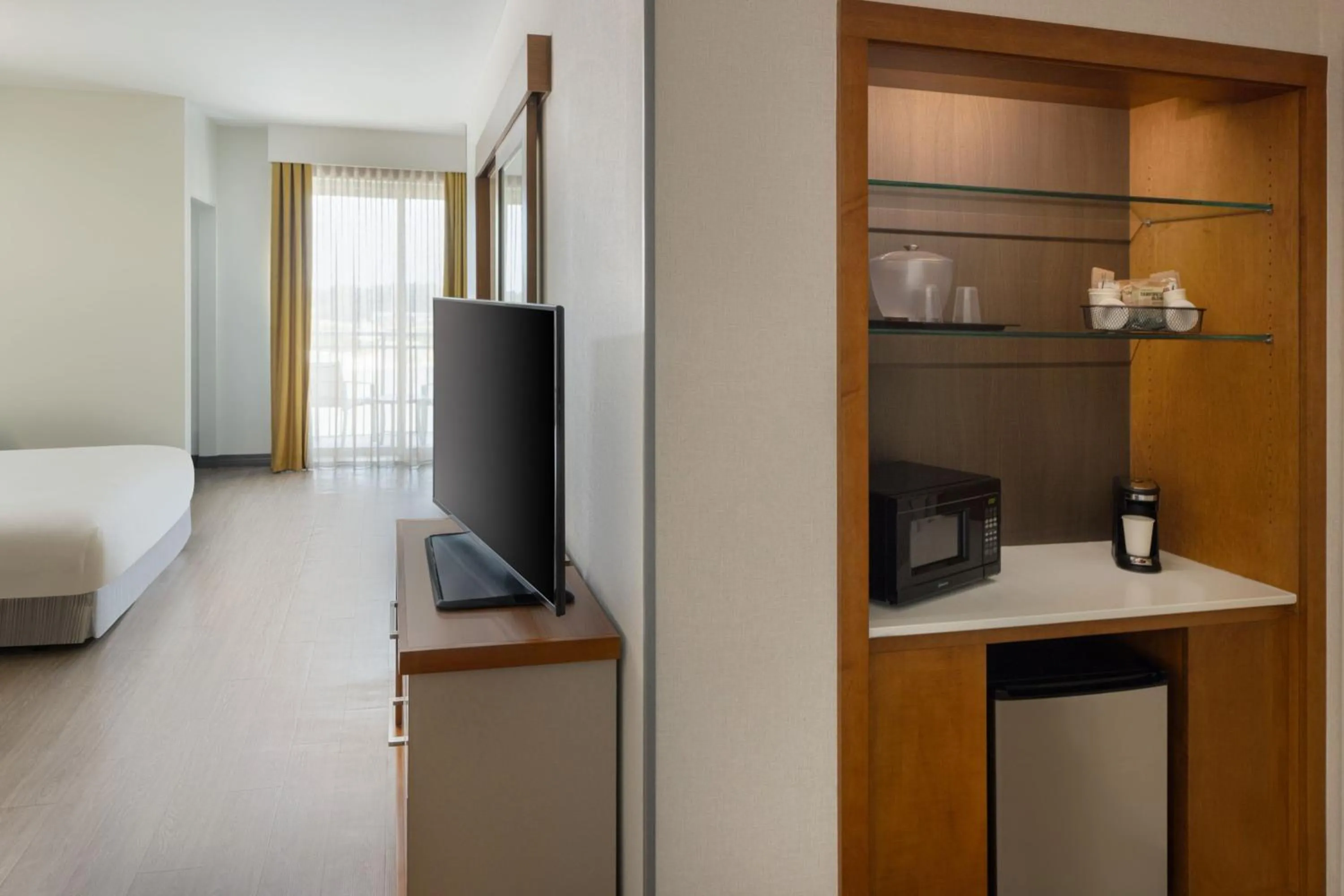 Photo of the whole room, Bed in SpringHill Suites Orange Beach at The Wharf