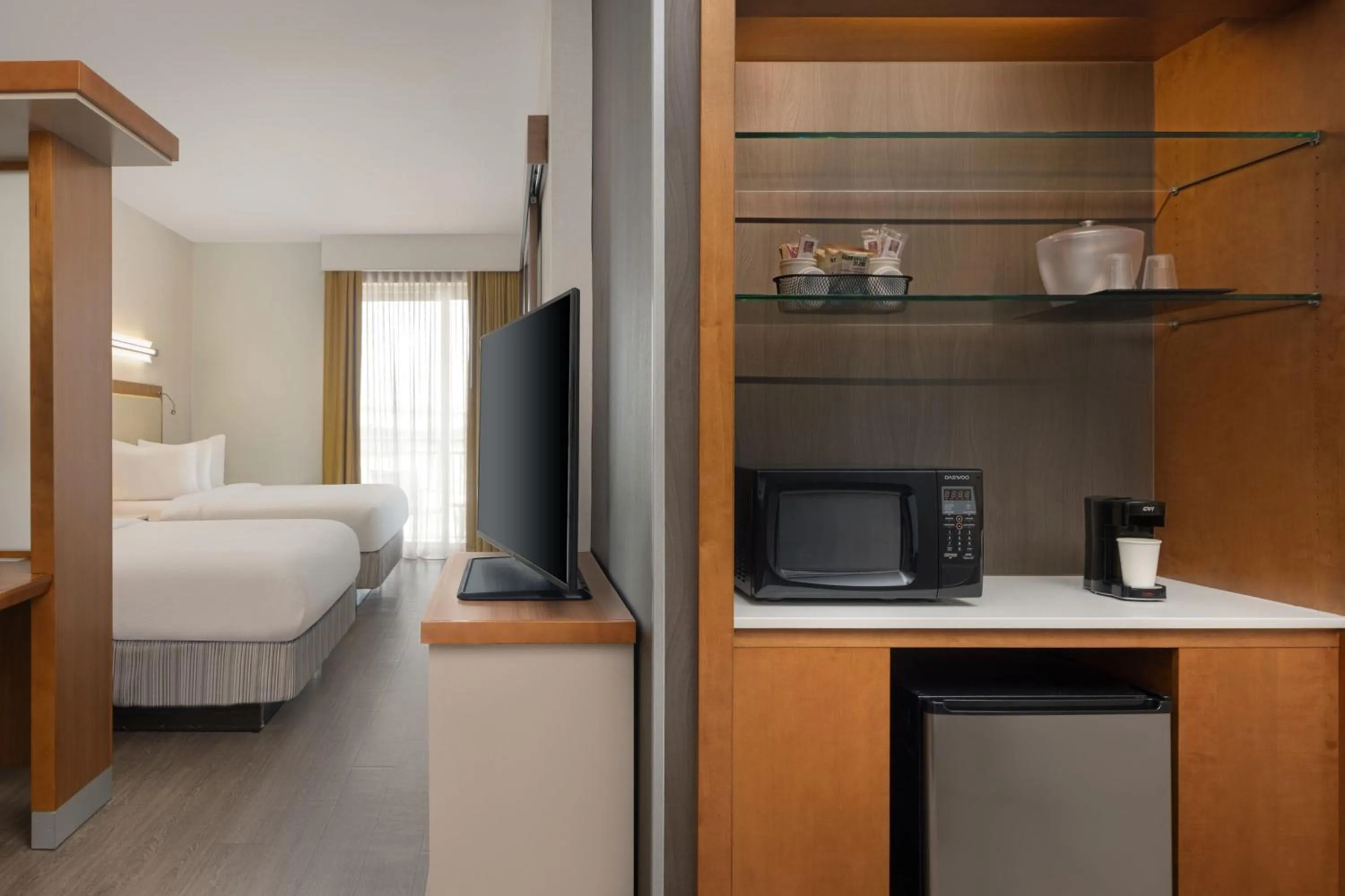 Photo of the whole room, Bed in SpringHill Suites Orange Beach at The Wharf