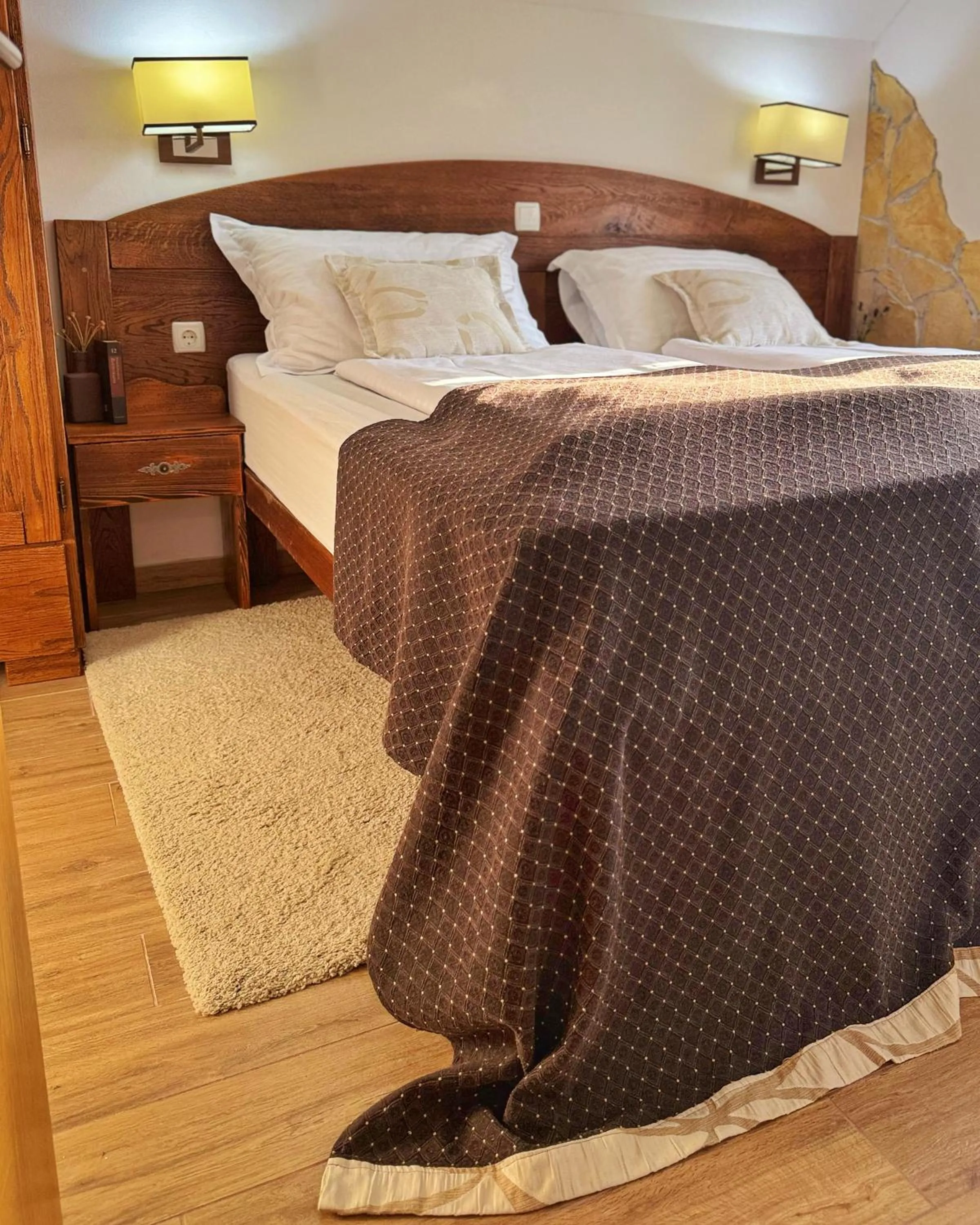 Bed in Etno Garden Apartments