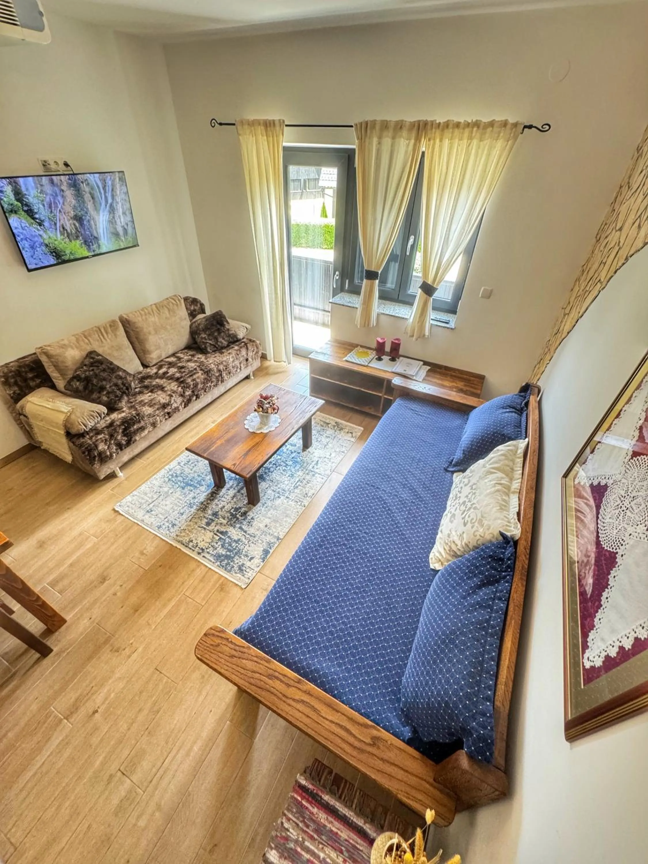 Bed in Etno Garden Apartments