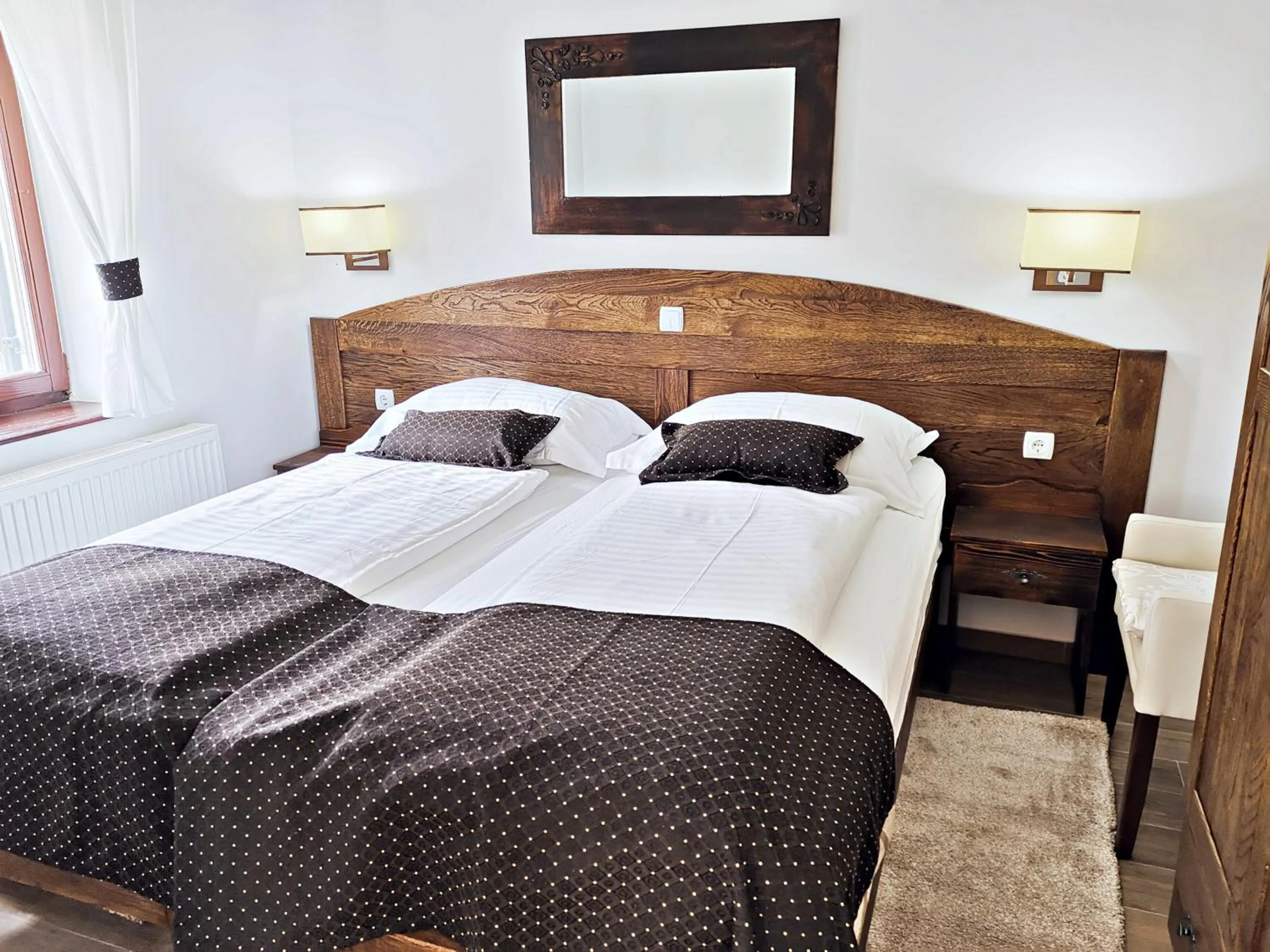 Bed in Etno Garden Apartments