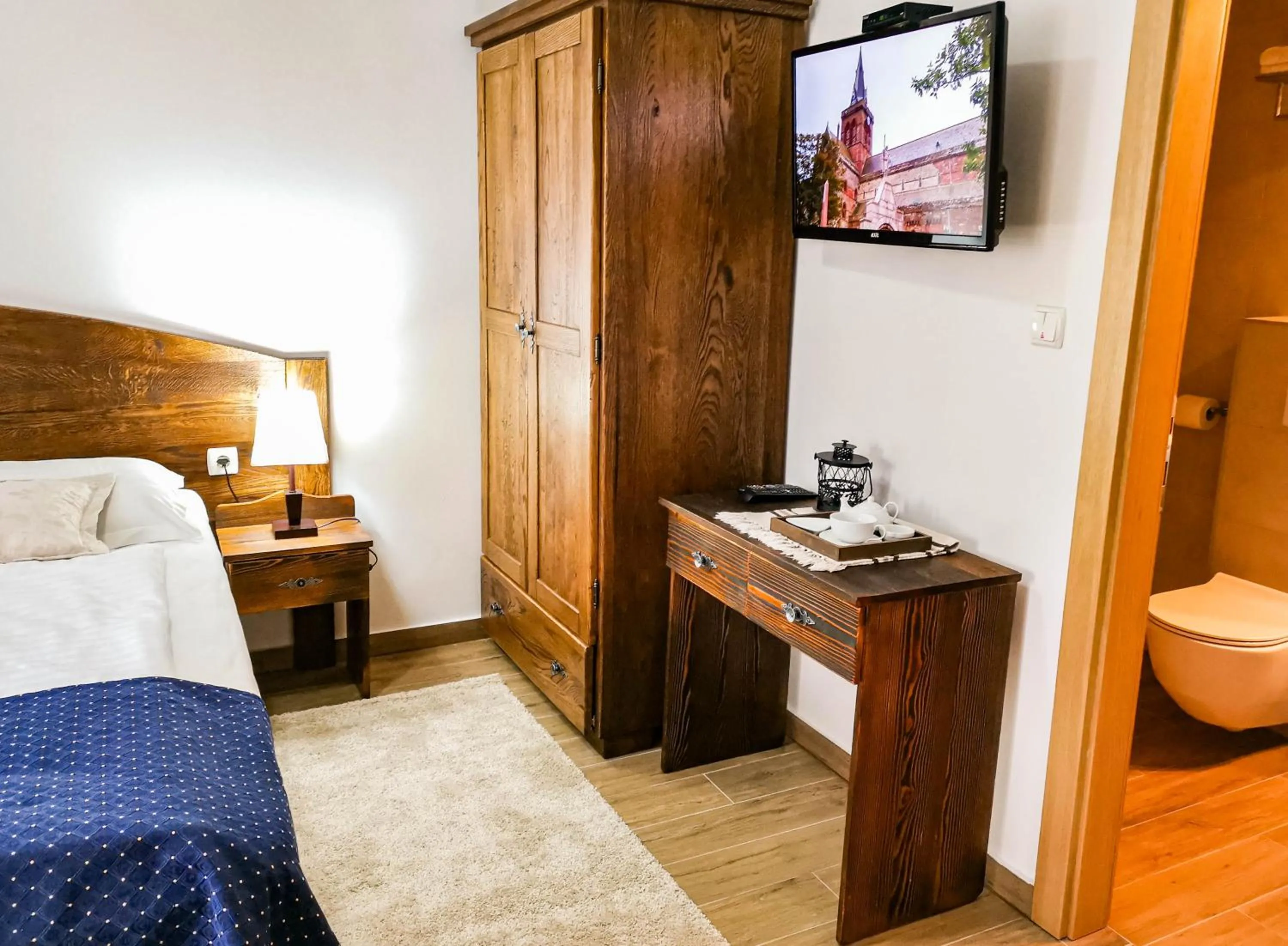 Bed in Etno Garden Apartments