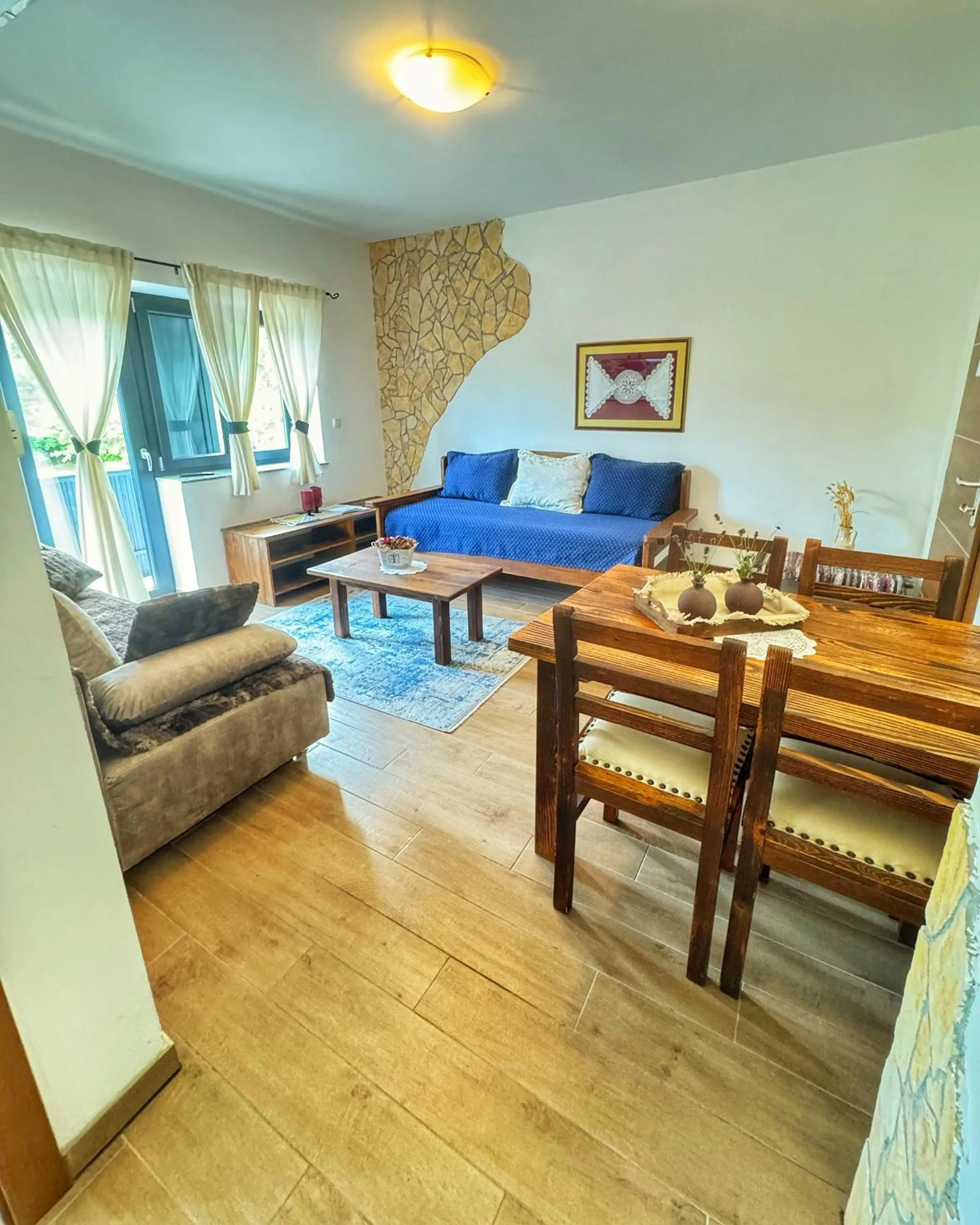 Bed in Etno Garden Apartments