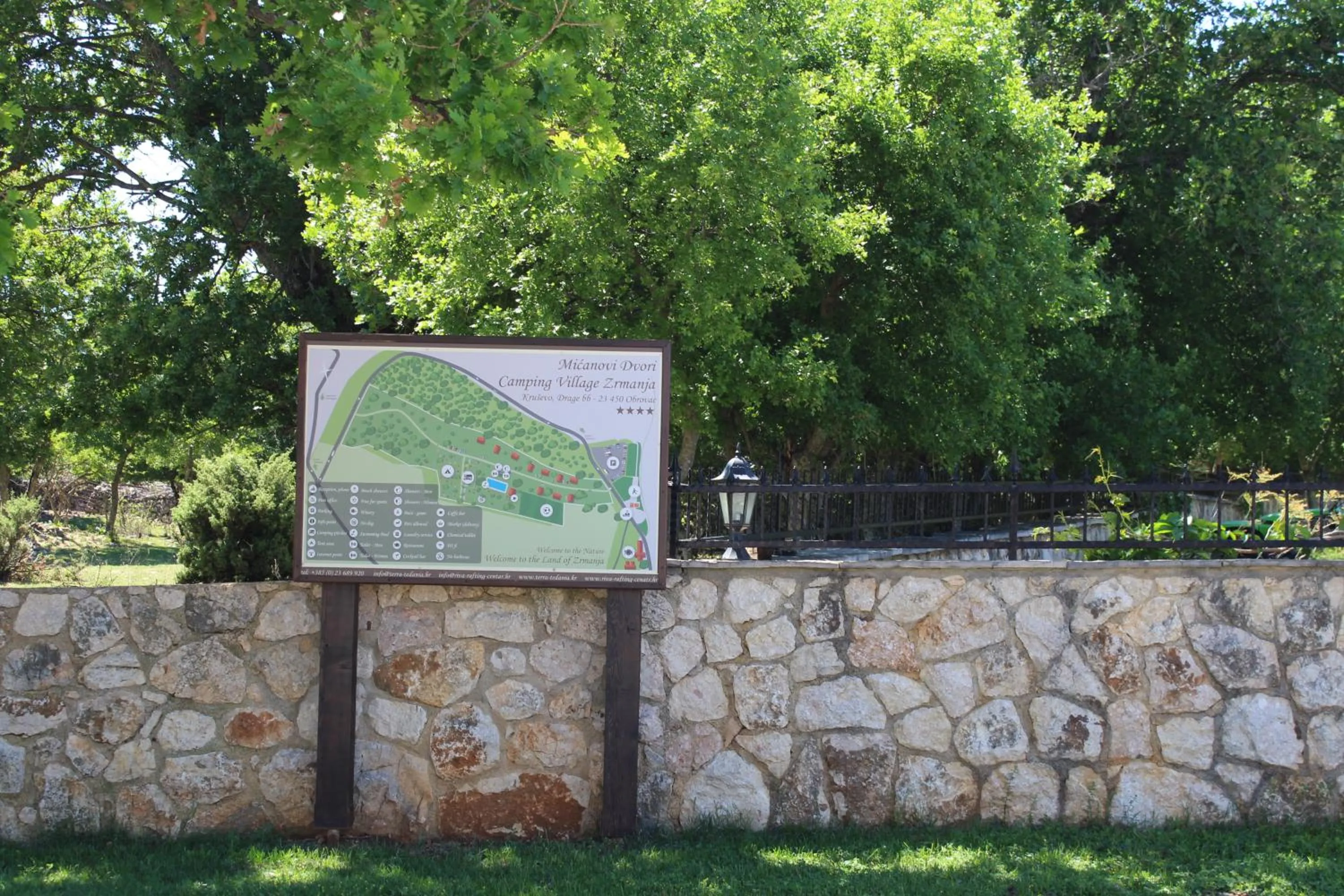 Property logo or sign in Micanovi Dvori Mobile Home Village Zrmanja