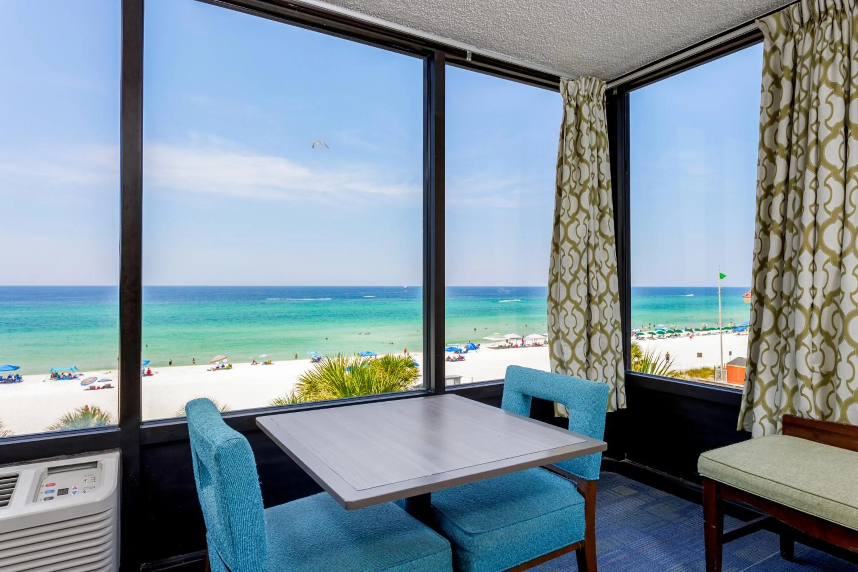 Seating area, Bed in Bikini Beach Resort
