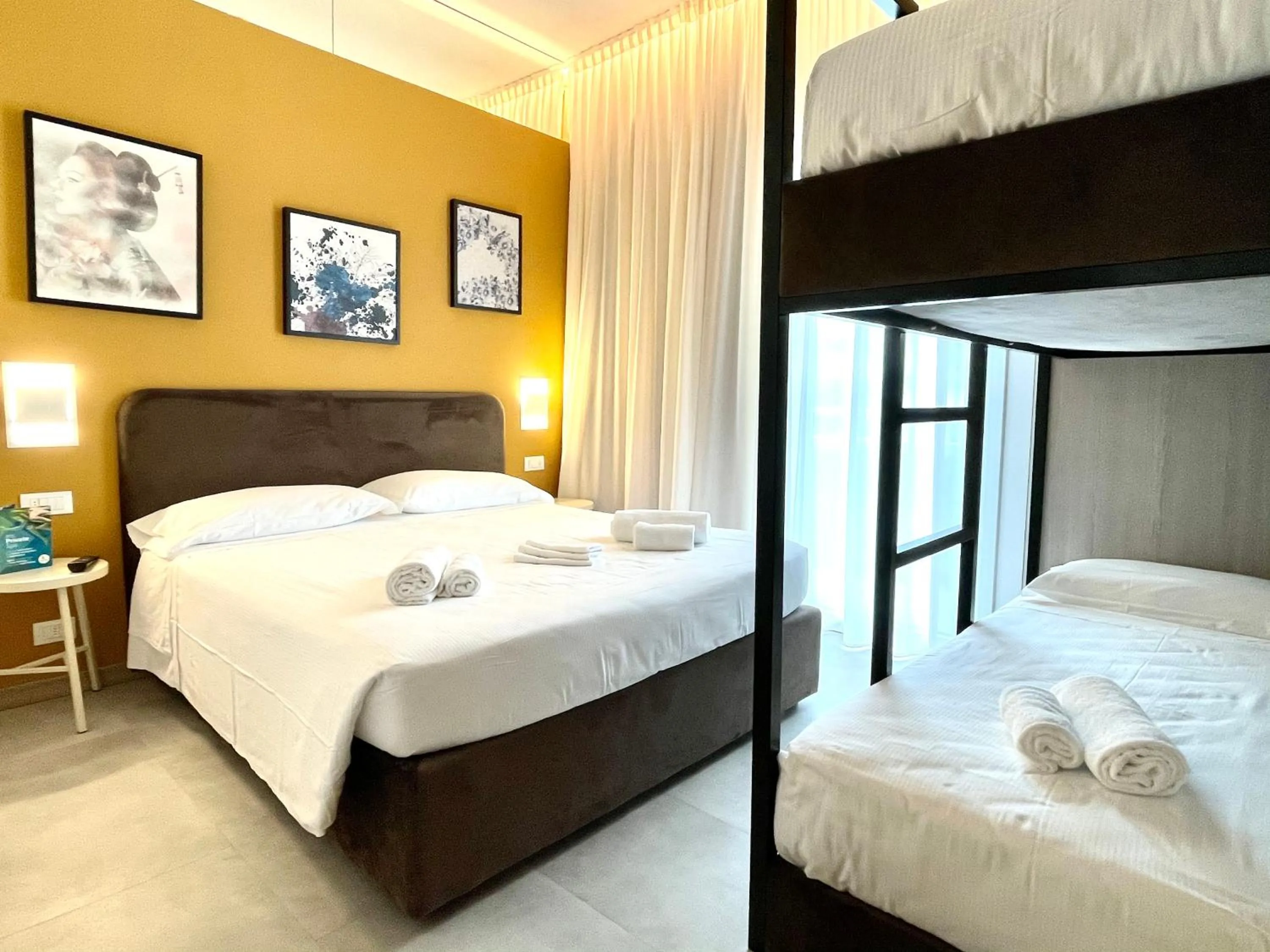 Bed in Hotel Iris Jesolo