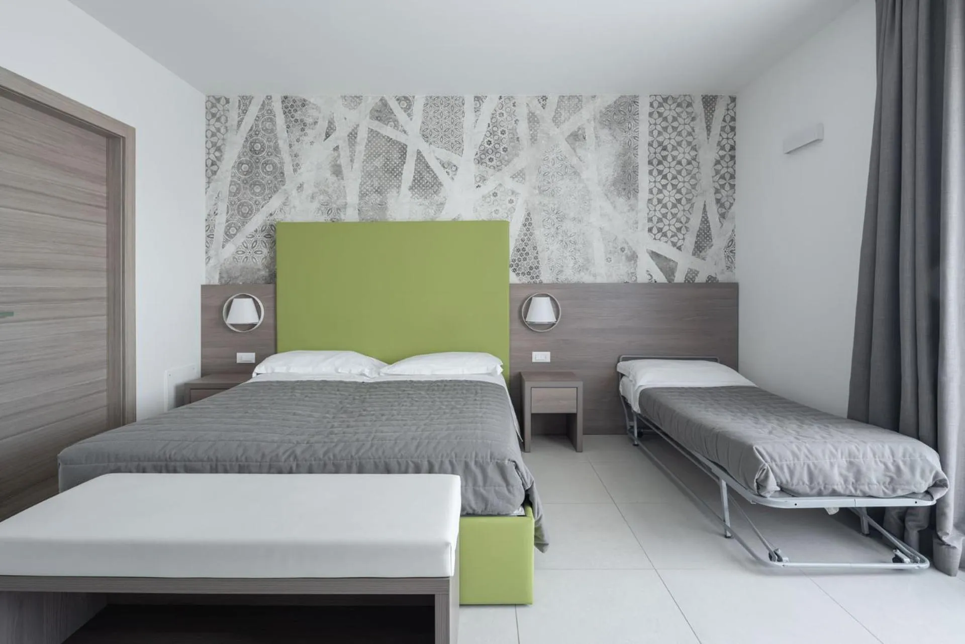 Bed in Hotel Iris Jesolo