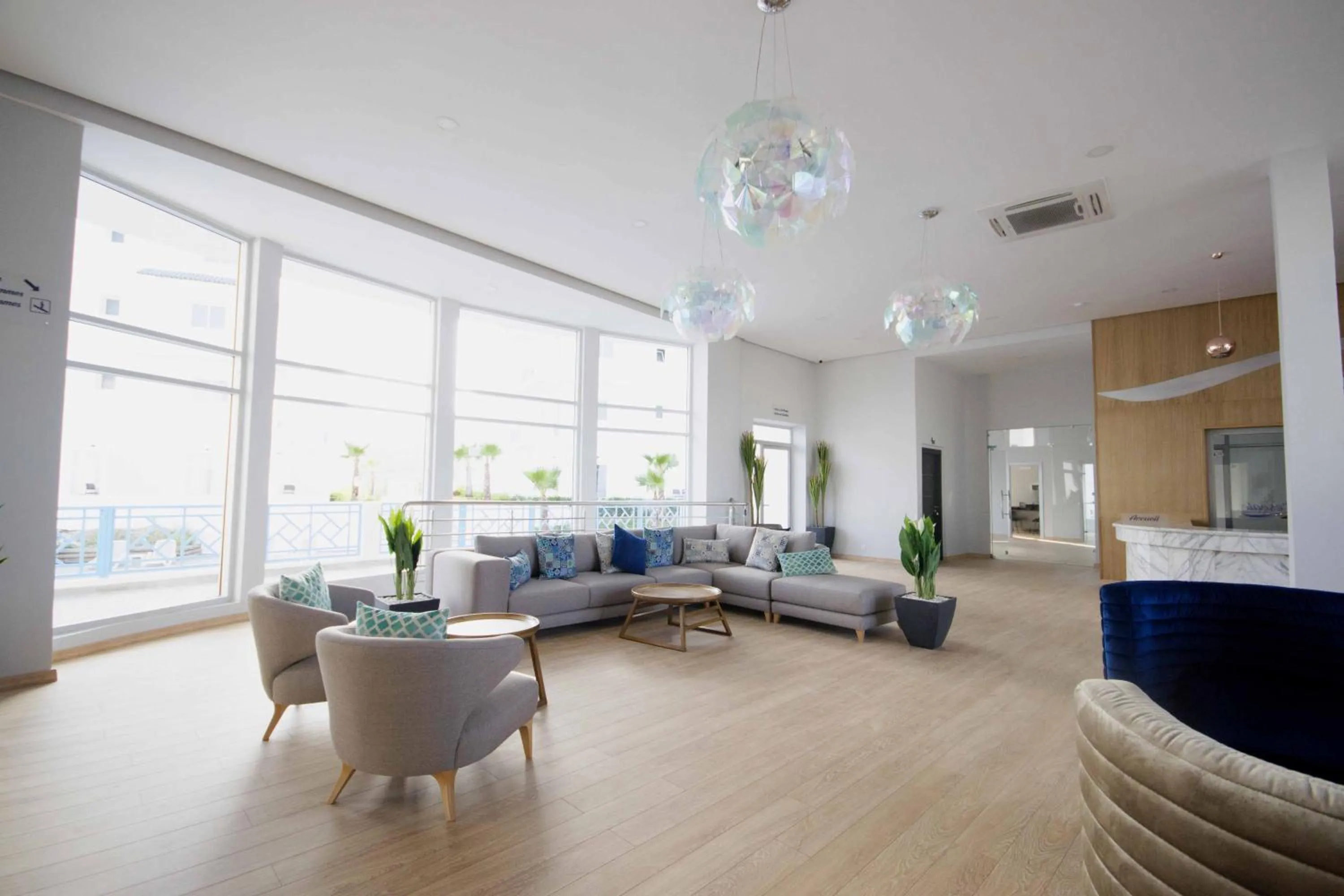 Lobby or reception in L'escale Appart-hôtel By 7AV HOTELS