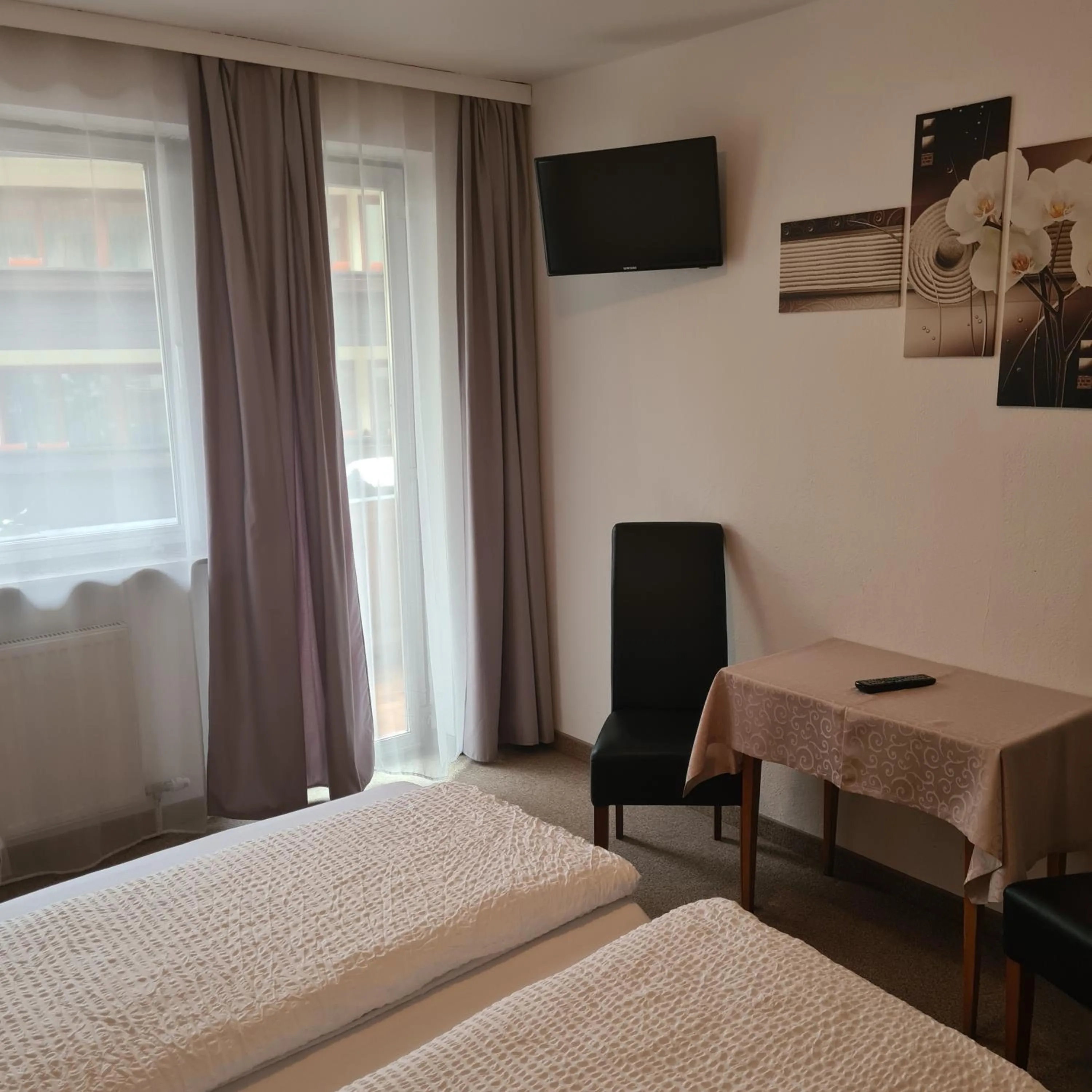 Photo of the whole room, Bed in Gasthof Hotel Kirchenwirt