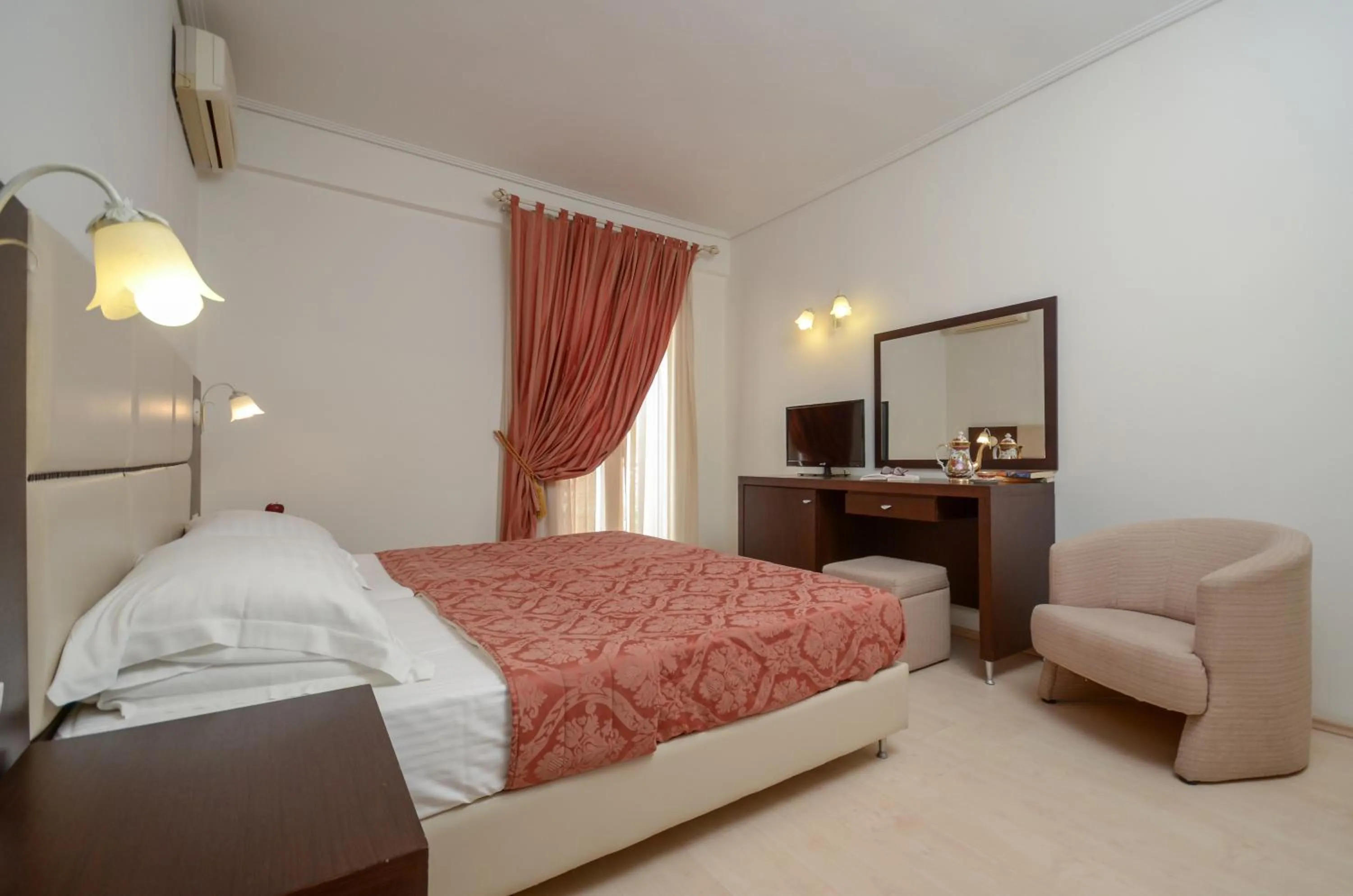 Bed in Aeolis Boutique Hotel