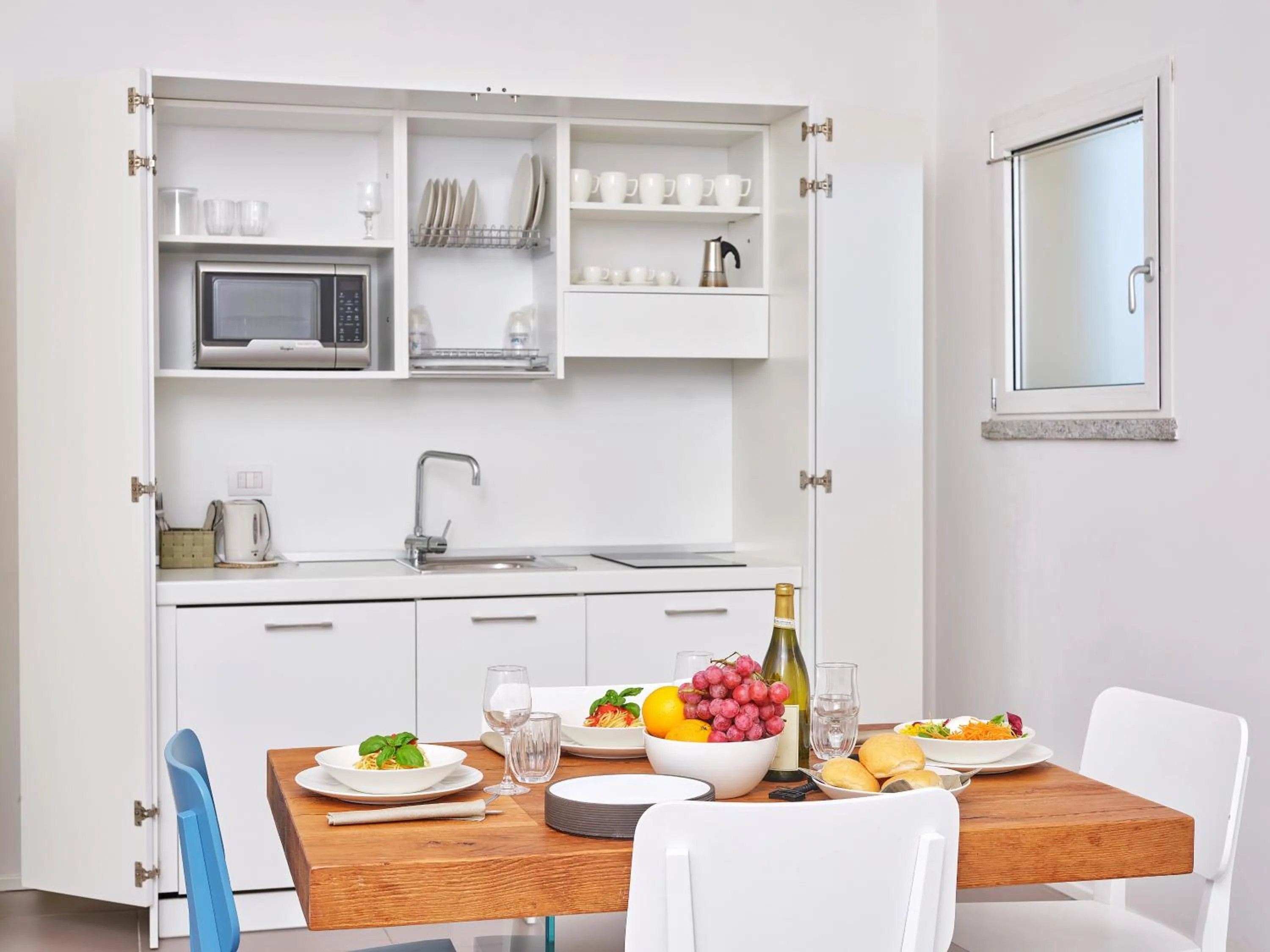 Kitchen or kitchenette in Felix Hotels - Hotel Residence Porto San Paolo