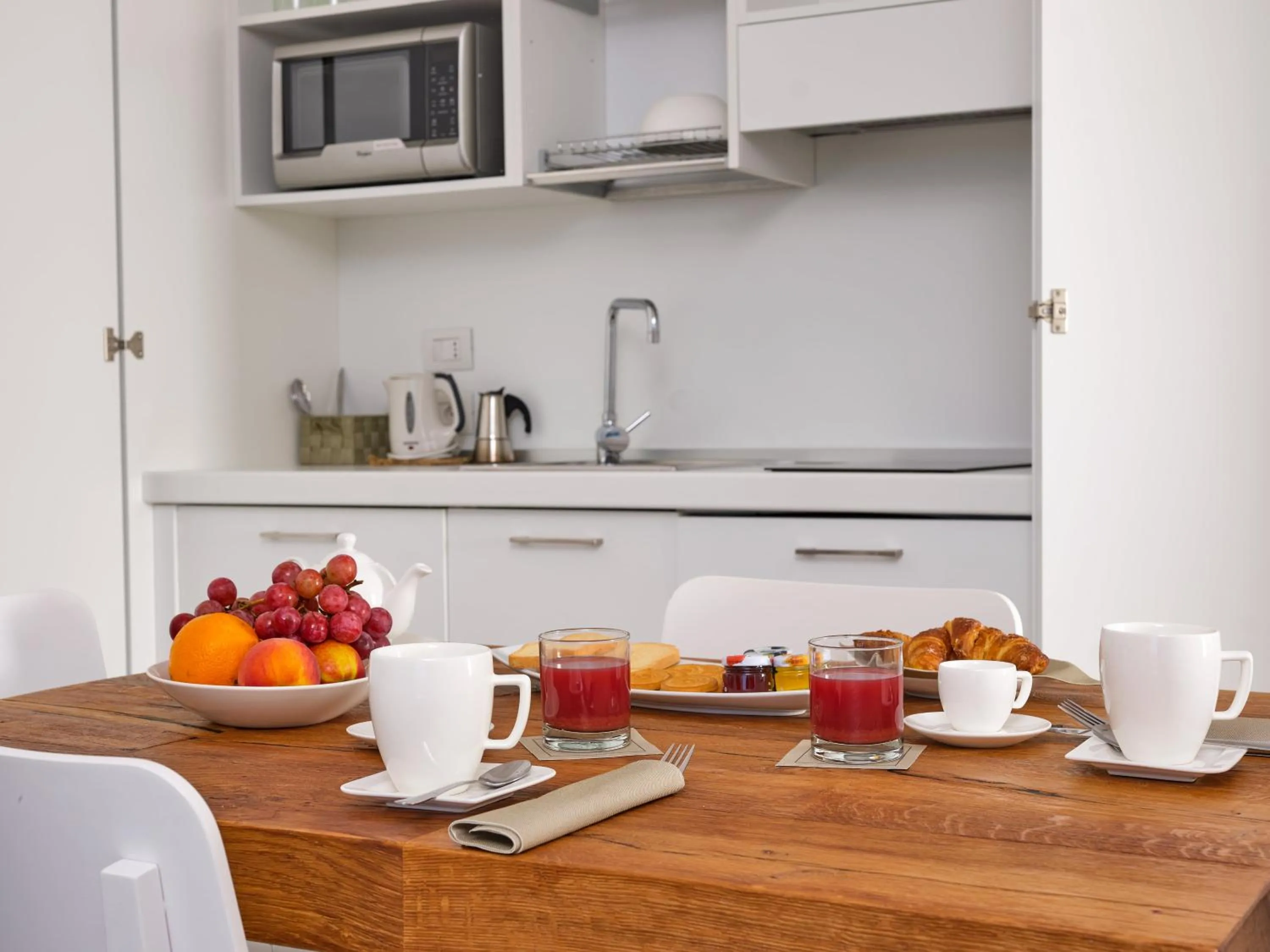 Kitchen or kitchenette in Felix Hotels - Hotel Residence Porto San Paolo