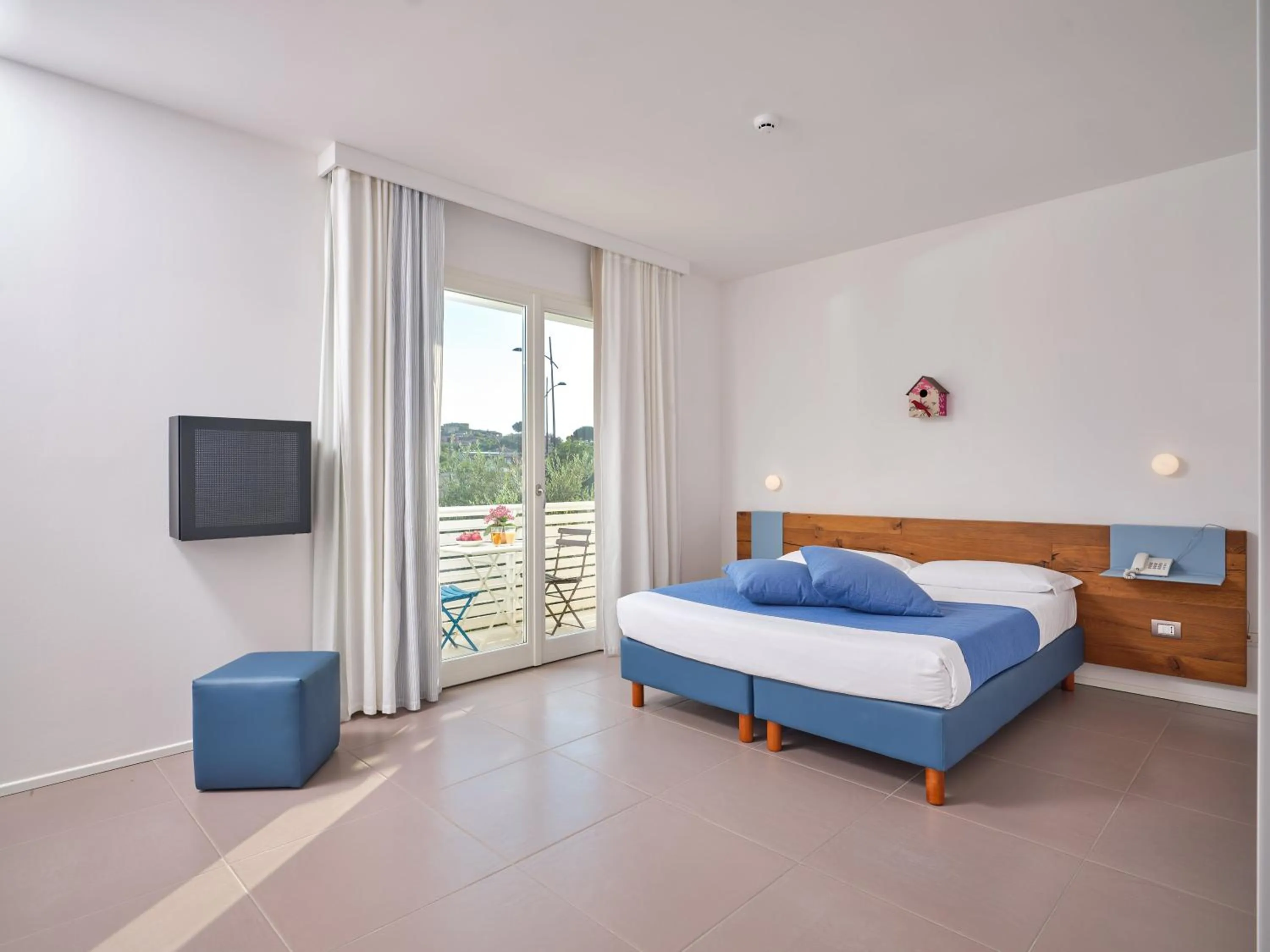 Patio, Bed in Felix Hotels - Hotel Residence Porto San Paolo