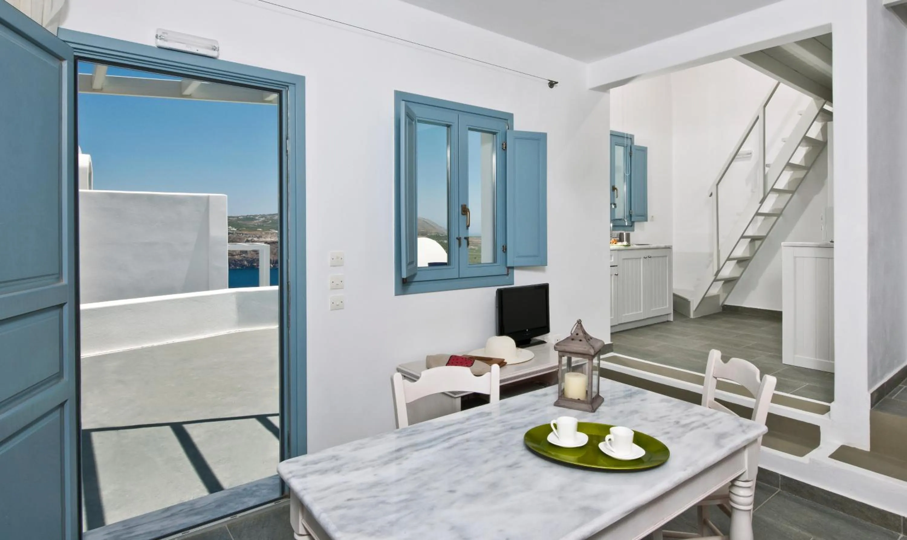 Dining area in Aura Marina Apartments Santorini