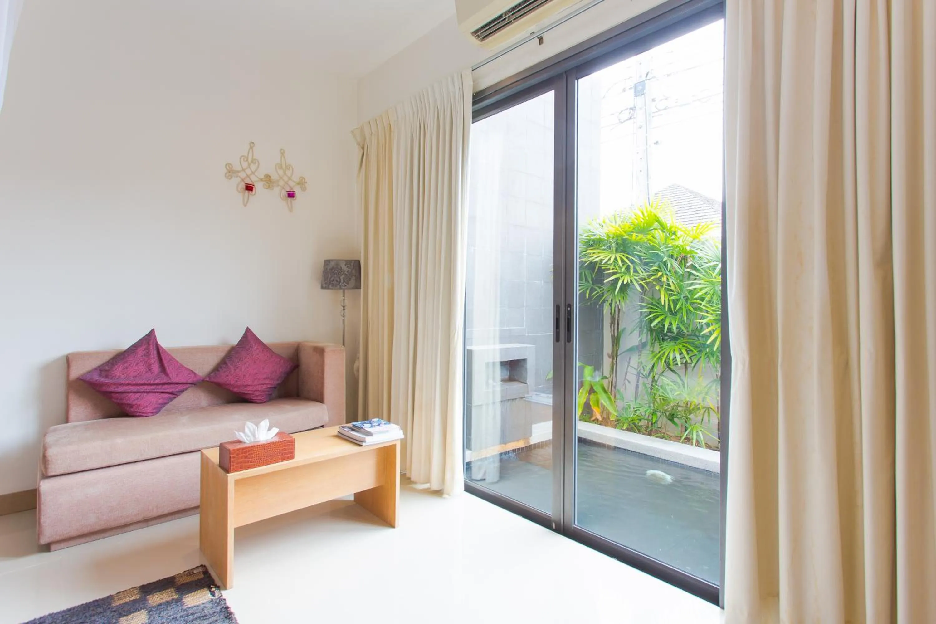 Seating area in Honeymooner Pool Villa@Seastone