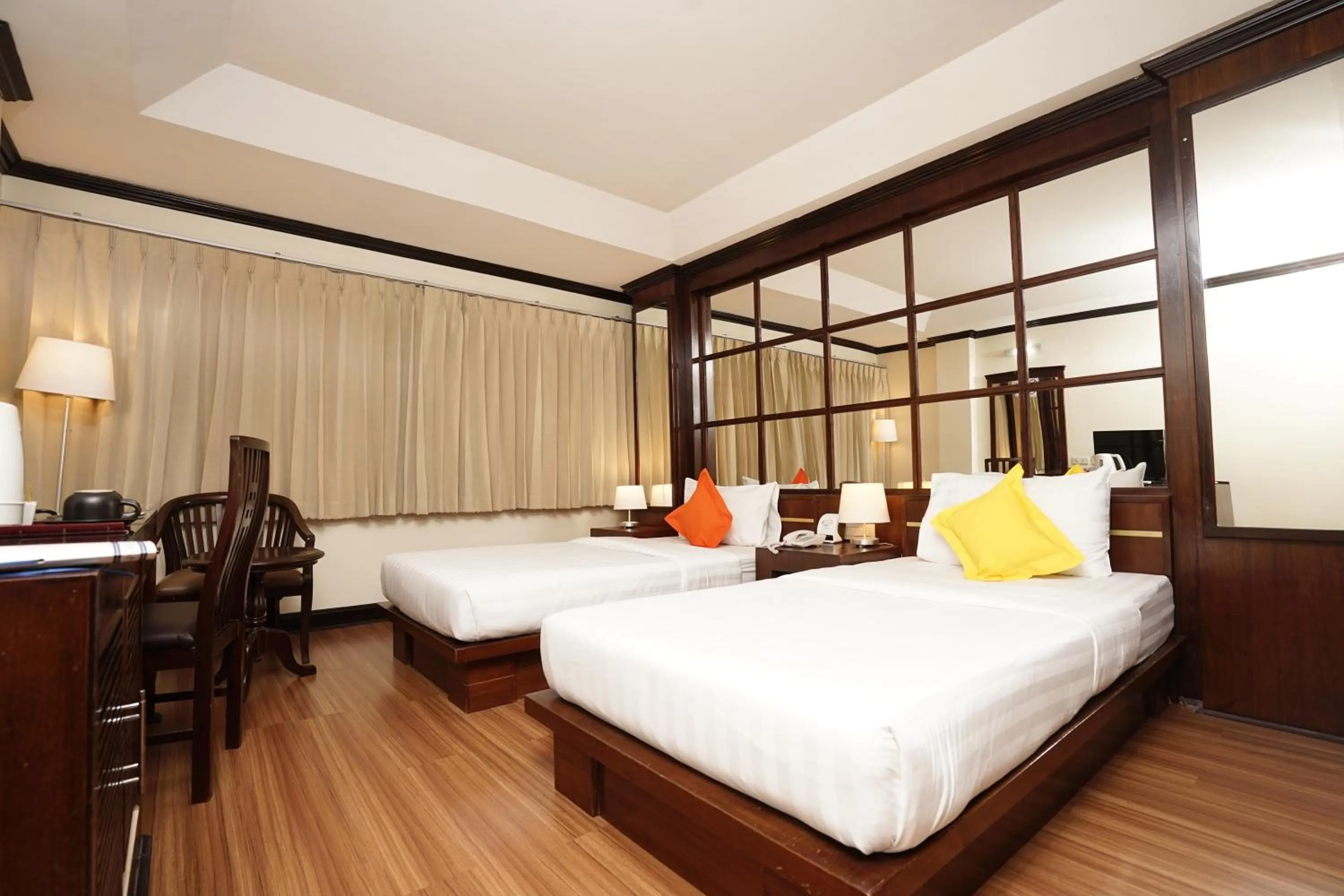 Bed in Grand Business Inn