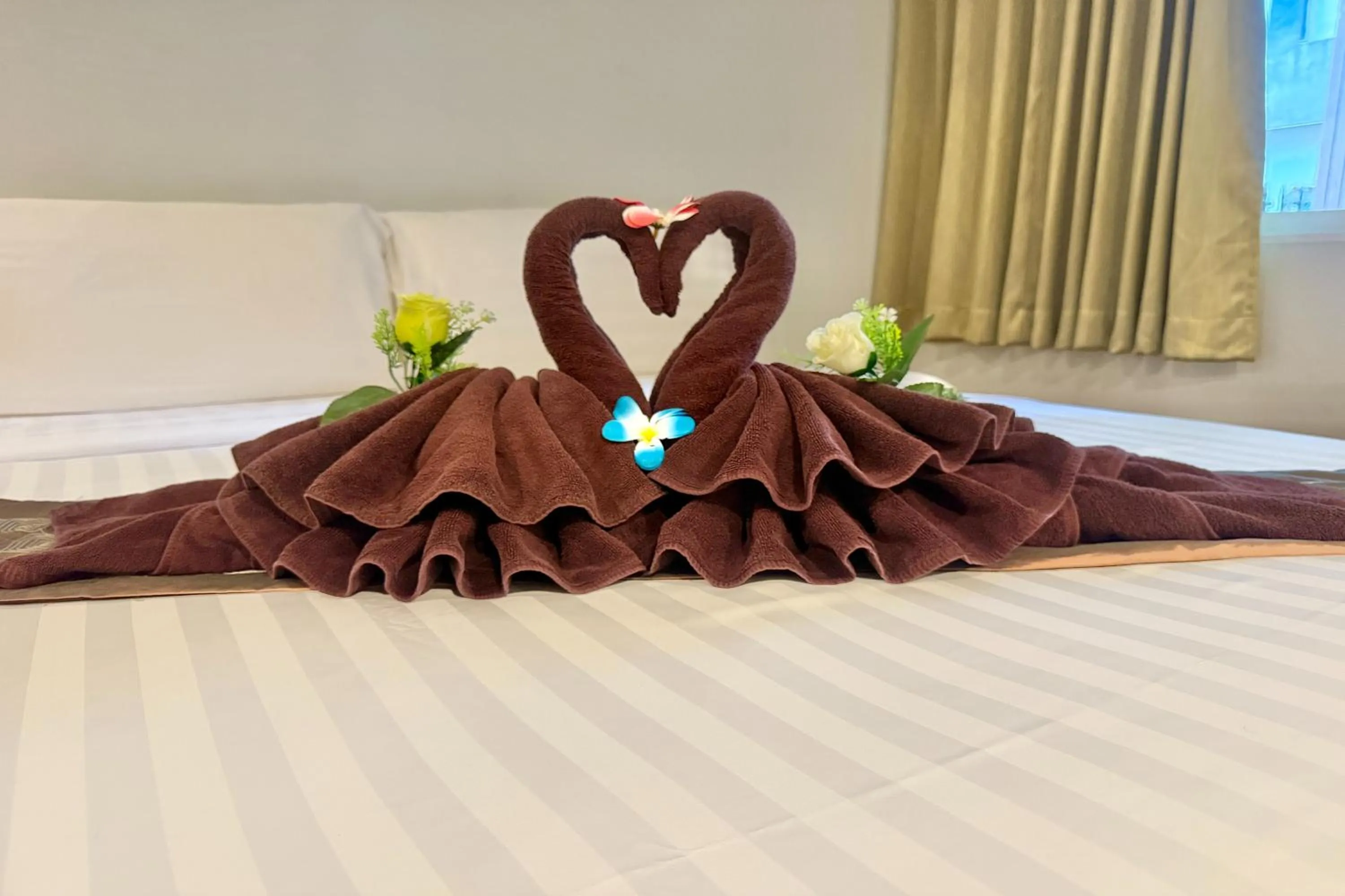 Bed in Sabaidee Chiangmai Hotel