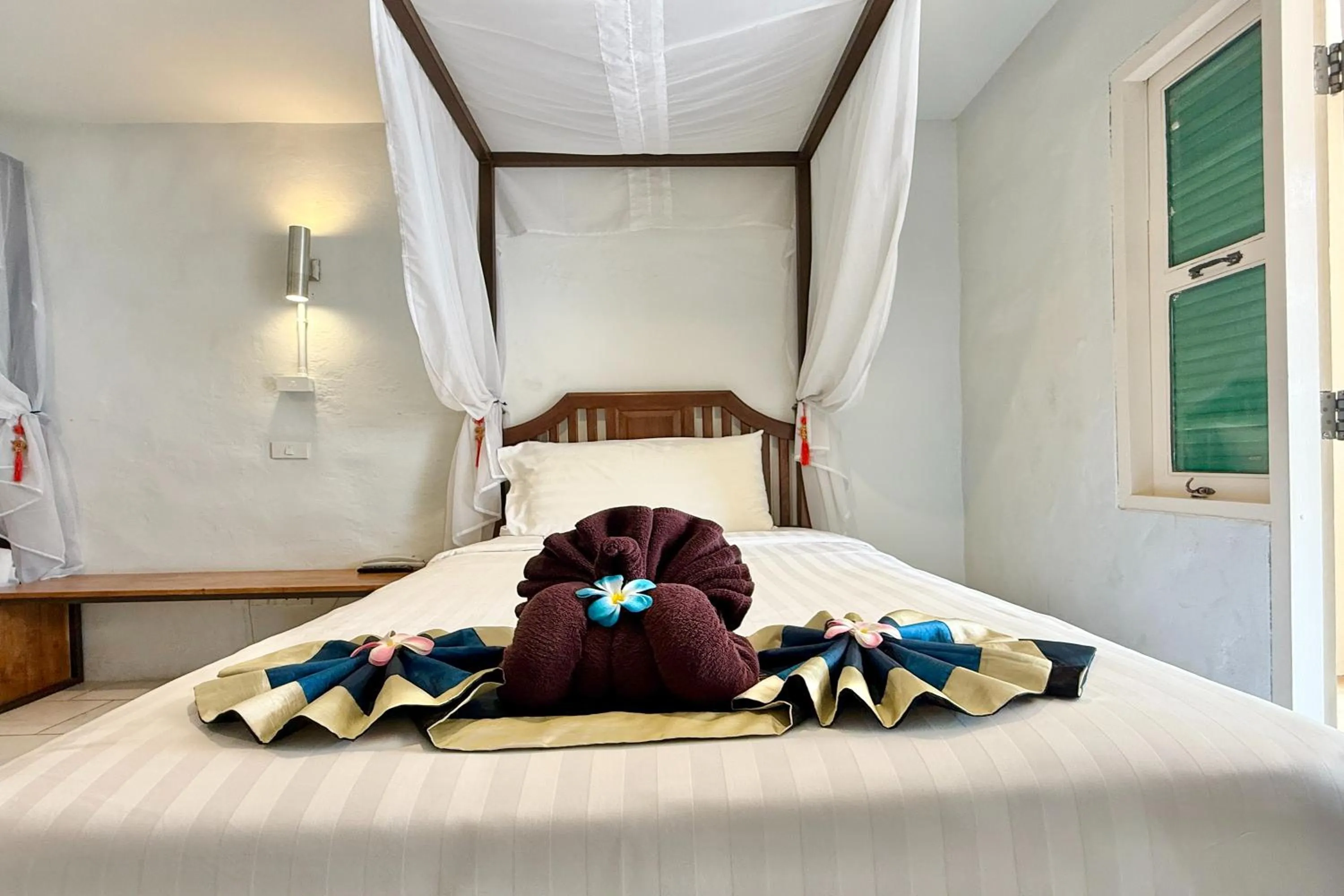 Bed in Sabaidee Chiangmai Hotel