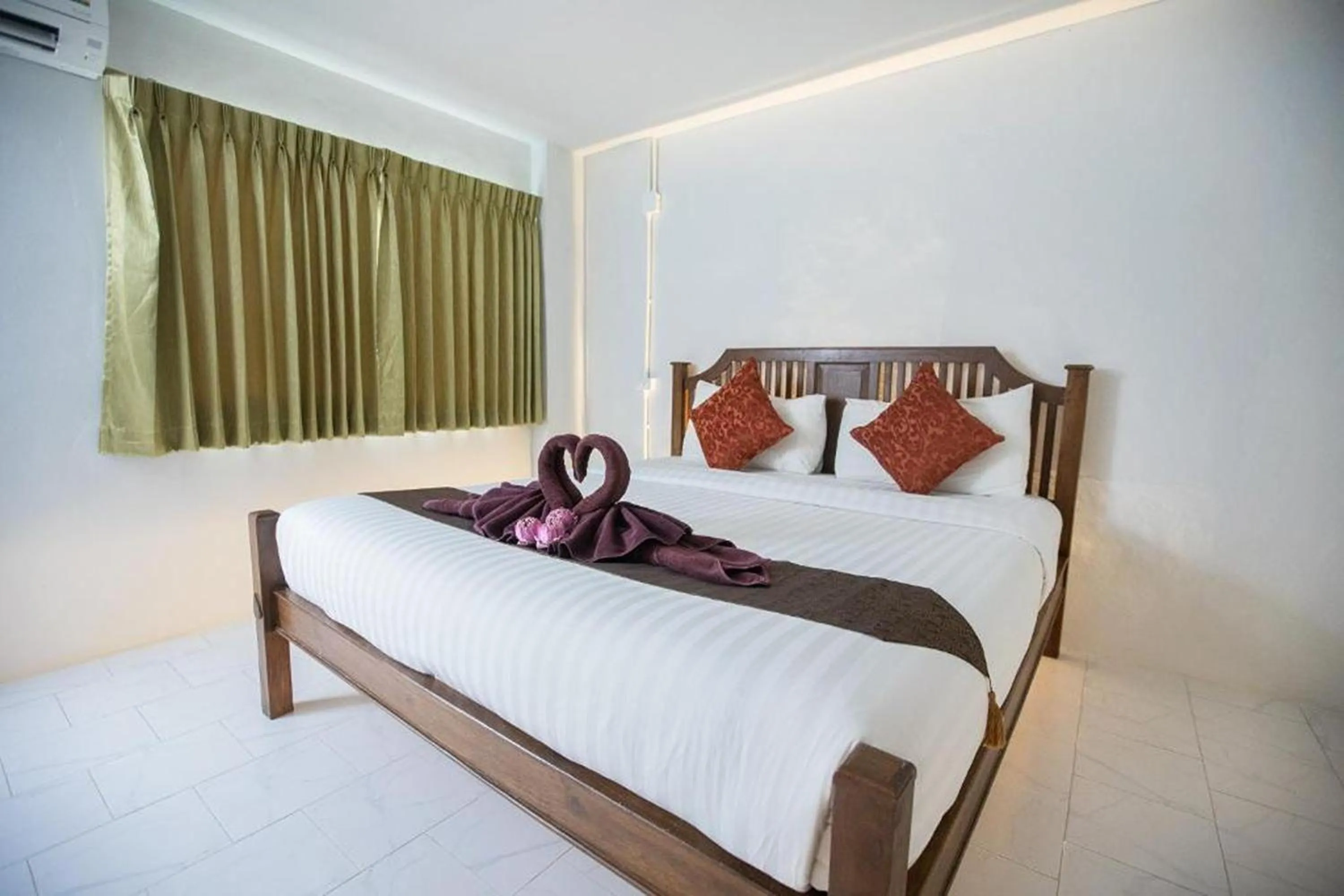 Bed in Sabaidee Chiangmai Hotel