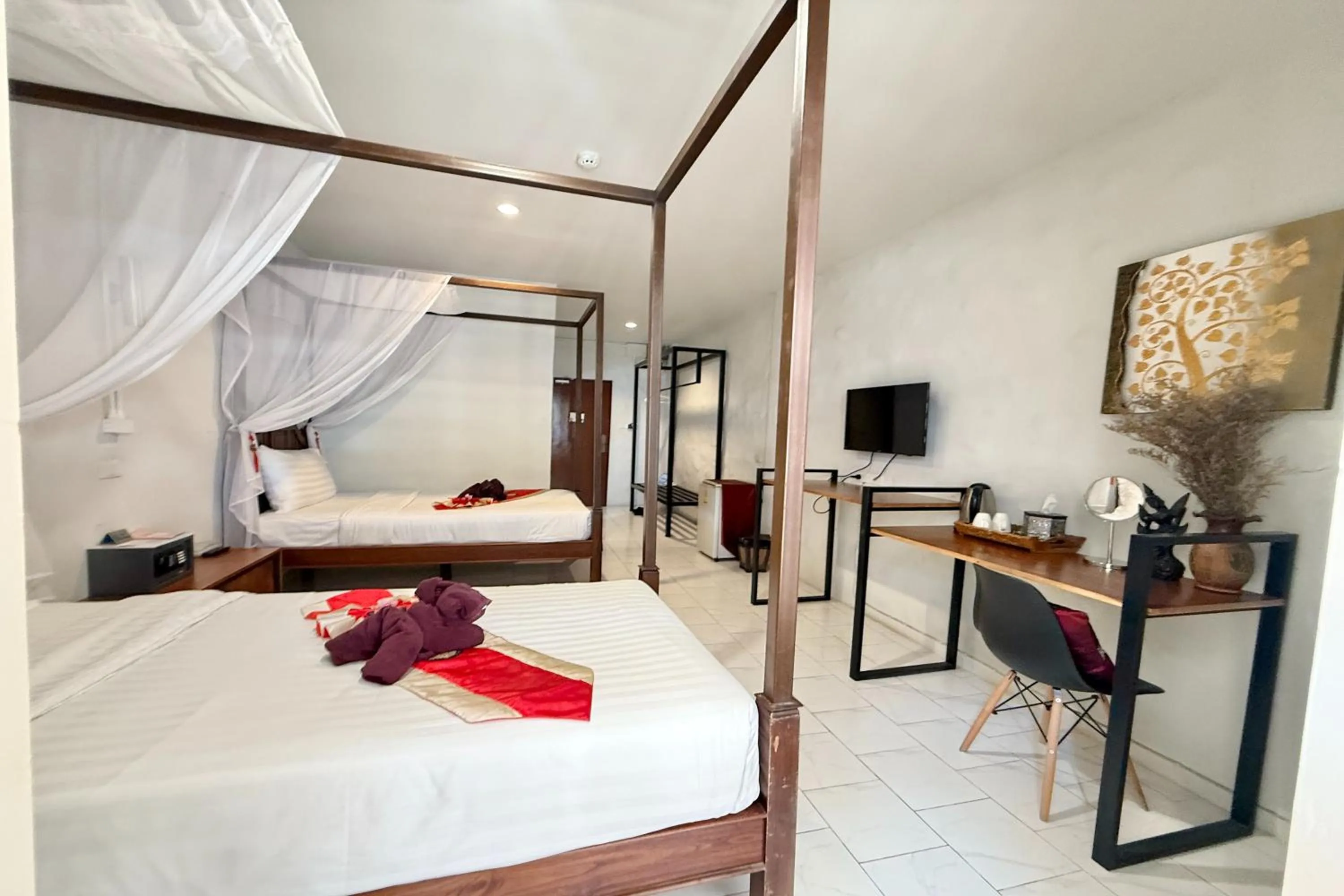 Bed in Sabaidee Chiangmai Hotel