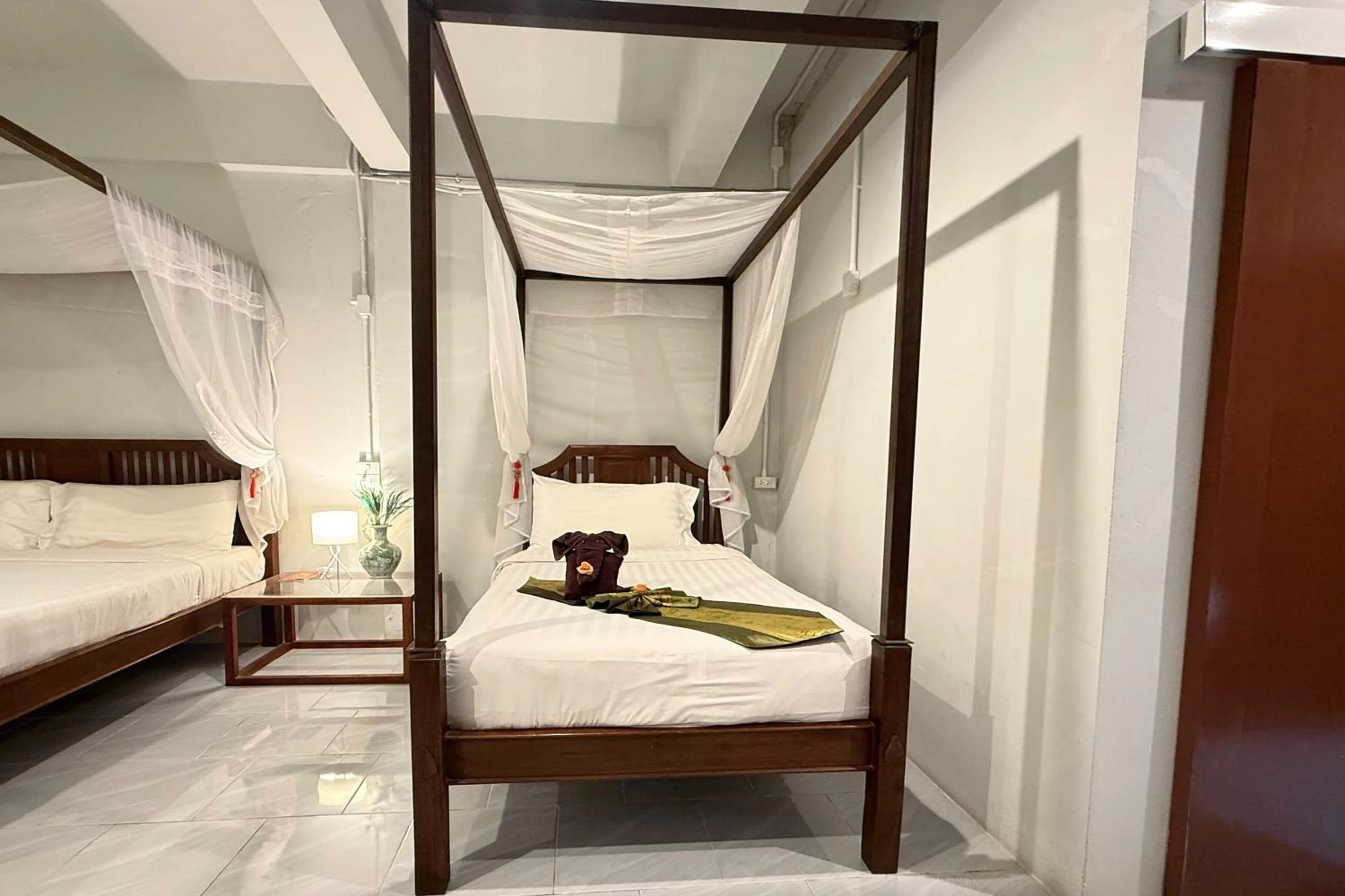 Bed in Sabaidee Chiangmai Hotel