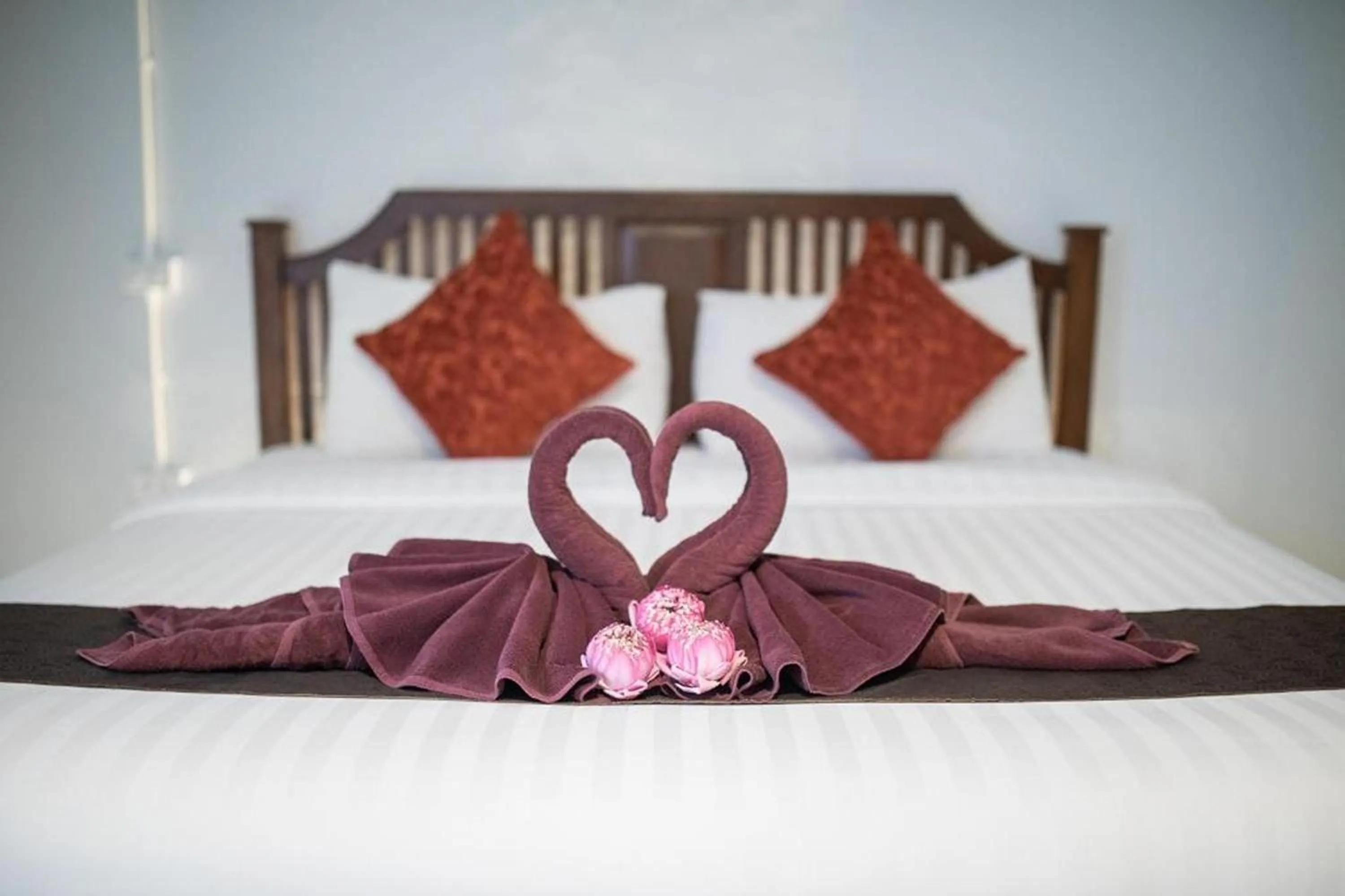 Bed in Sabaidee Chiangmai Hotel