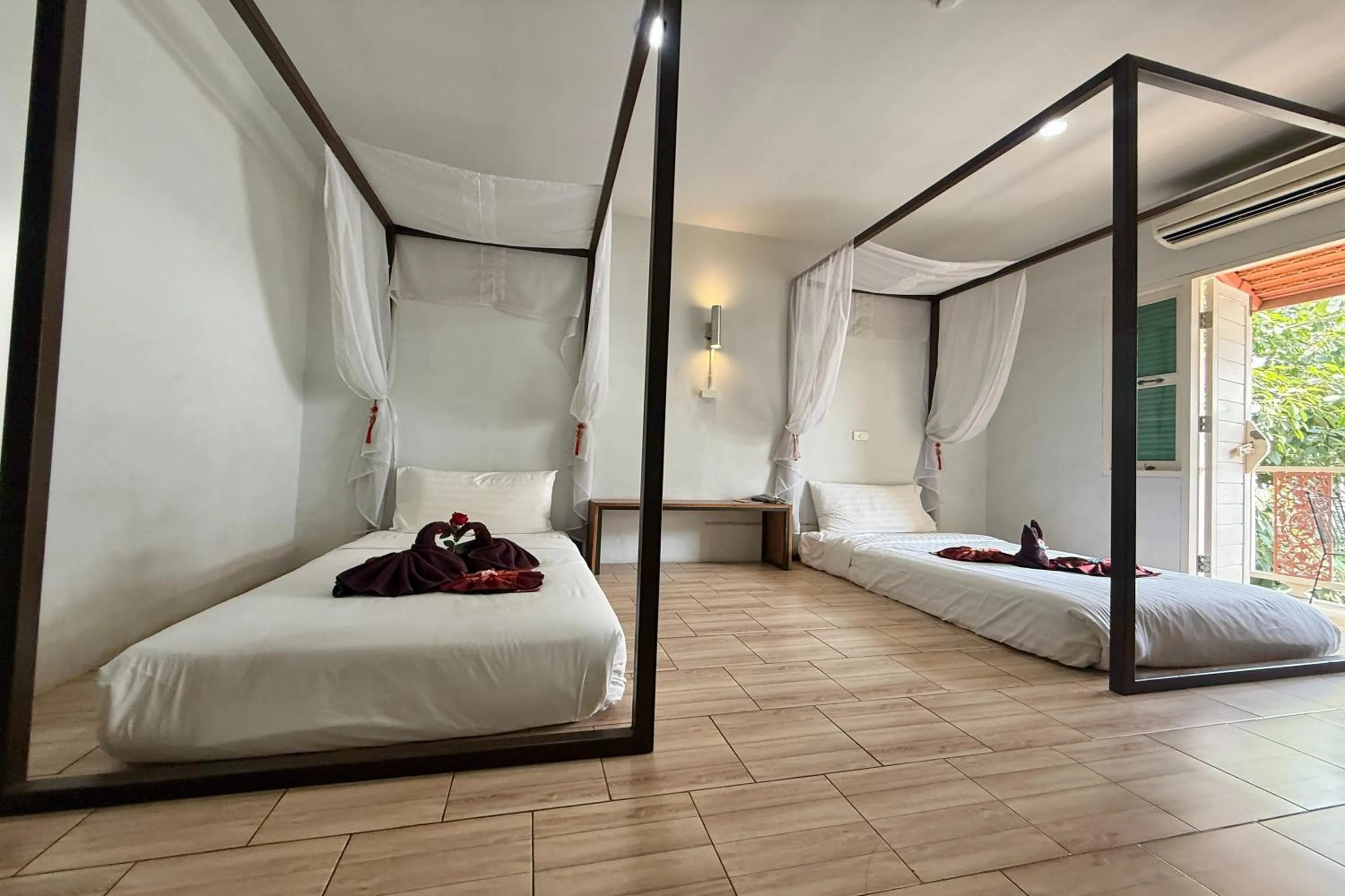 Bed in Sabaidee Chiangmai Hotel