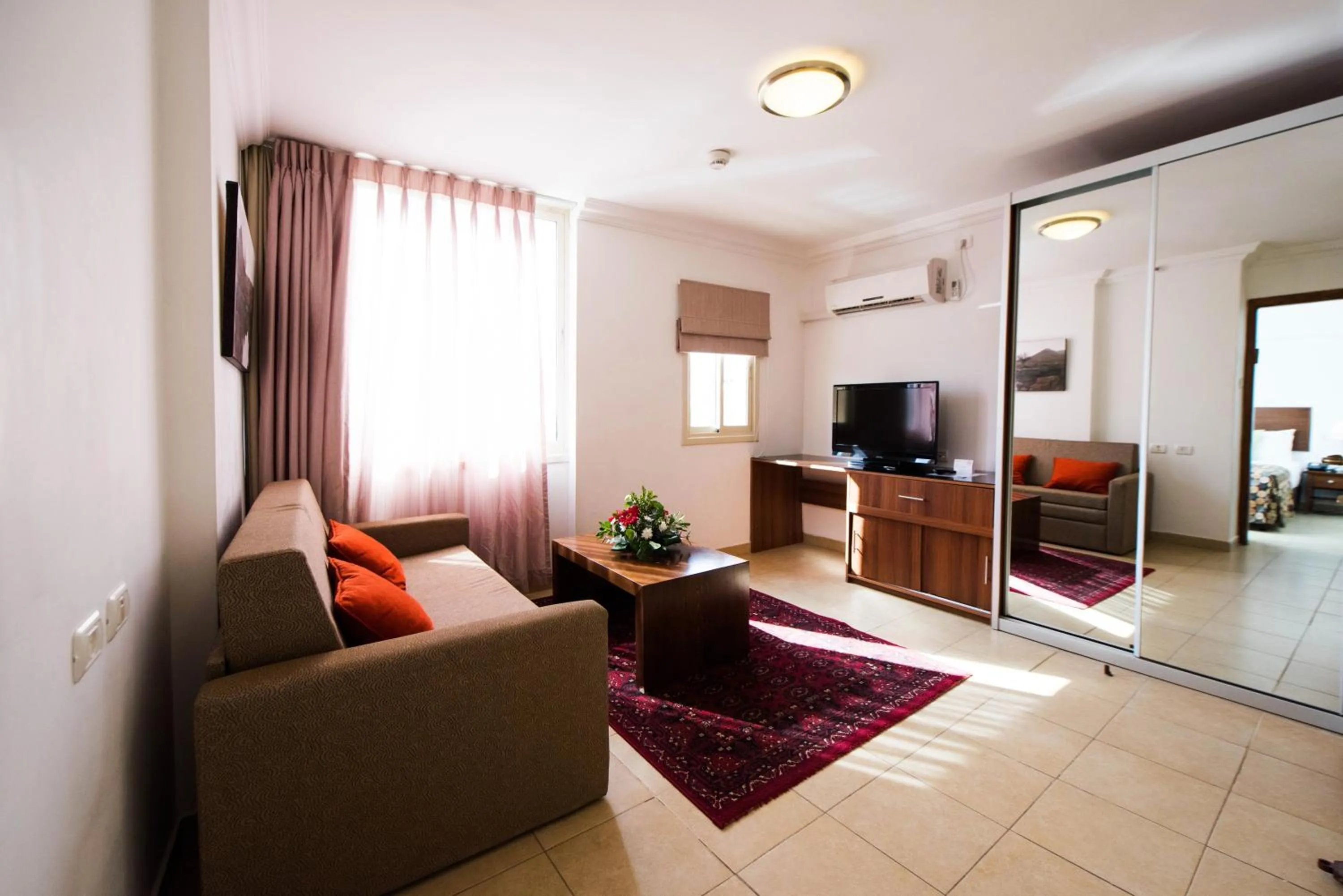 Living room in Ramon Suites by Smart Hotels