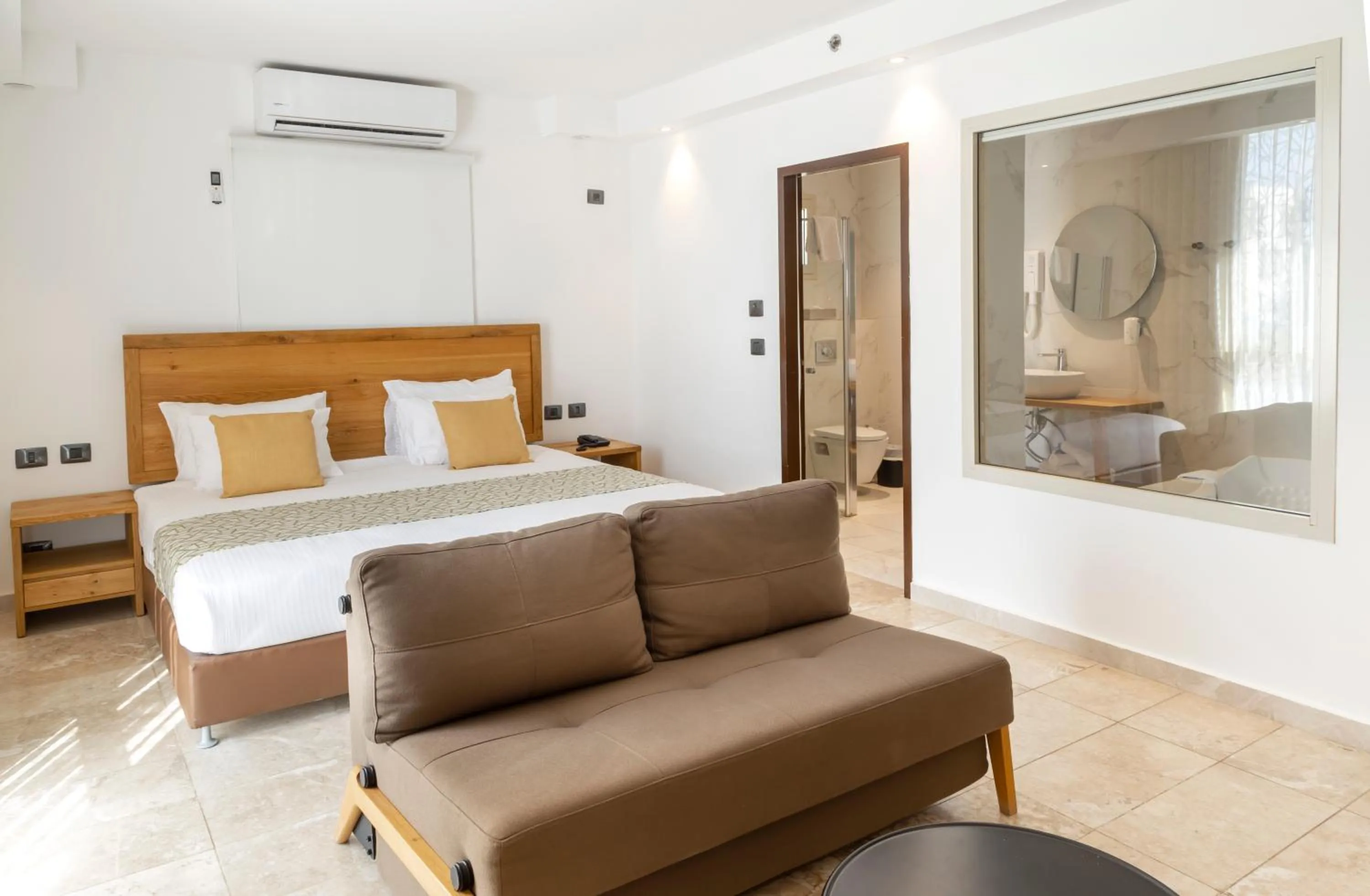 Bed in Ramon Suites by Smart Hotels