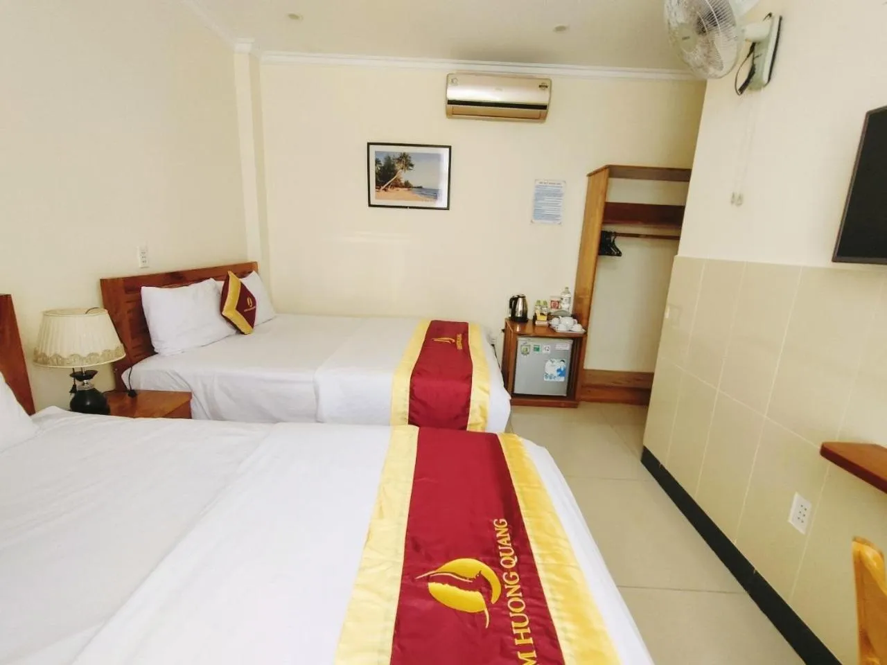 Bed in Kim Huong Quang Hotel