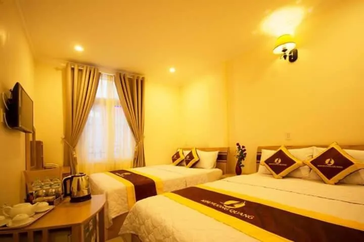 Bed in Kim Huong Quang Hotel