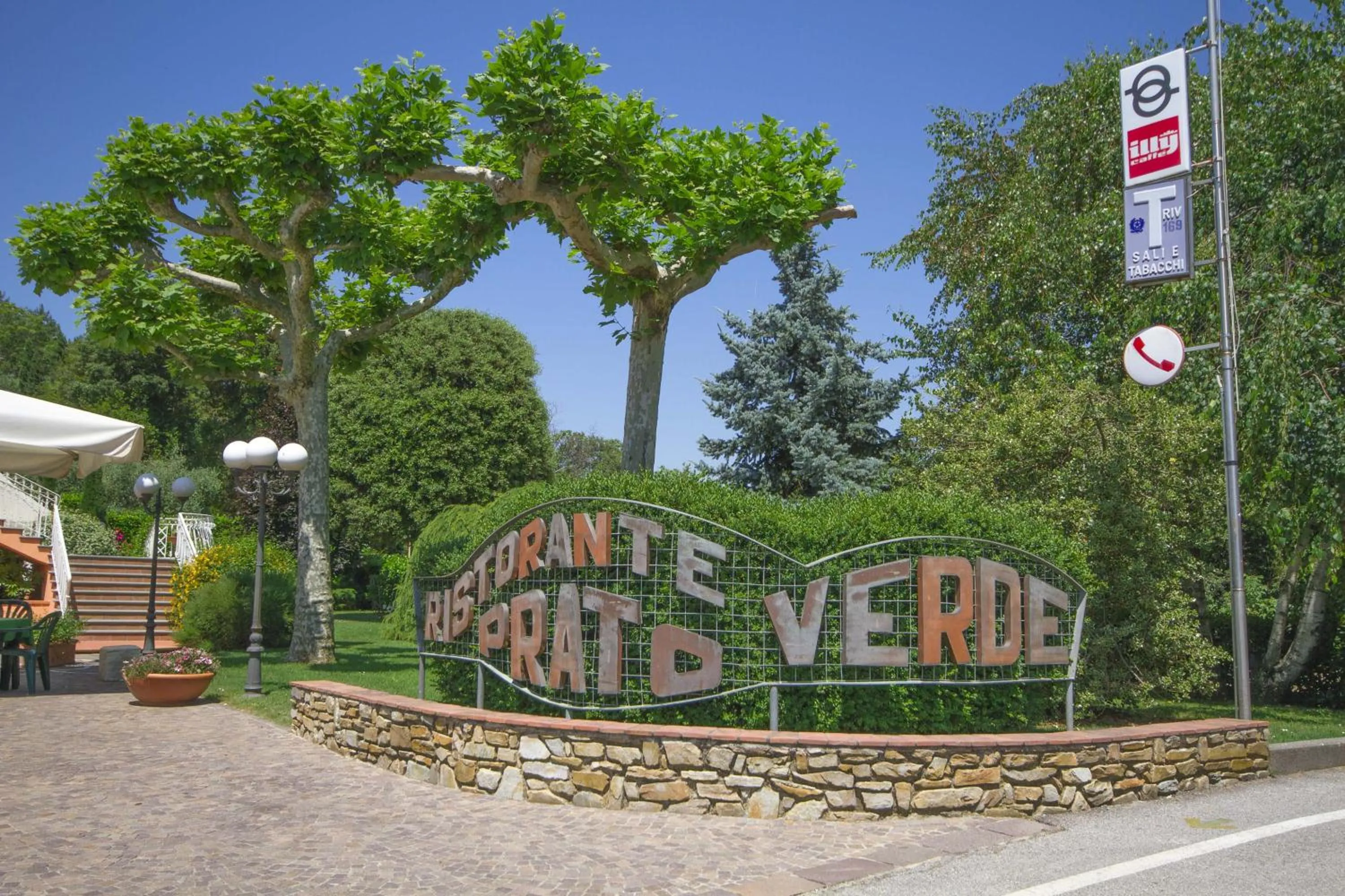 Property logo or sign in Holiday Prato Verde