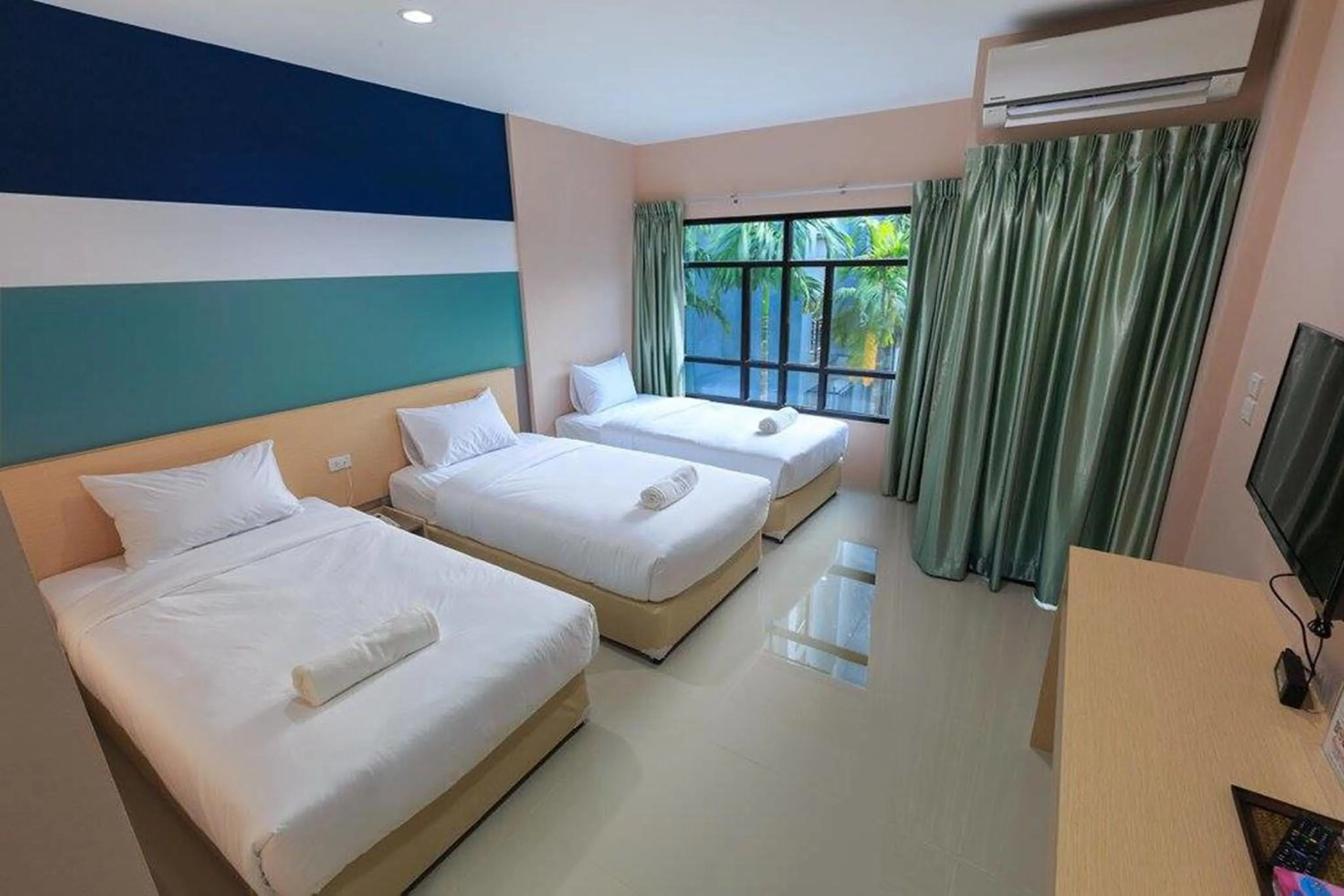 Bed in JJ Residence Phuket Town