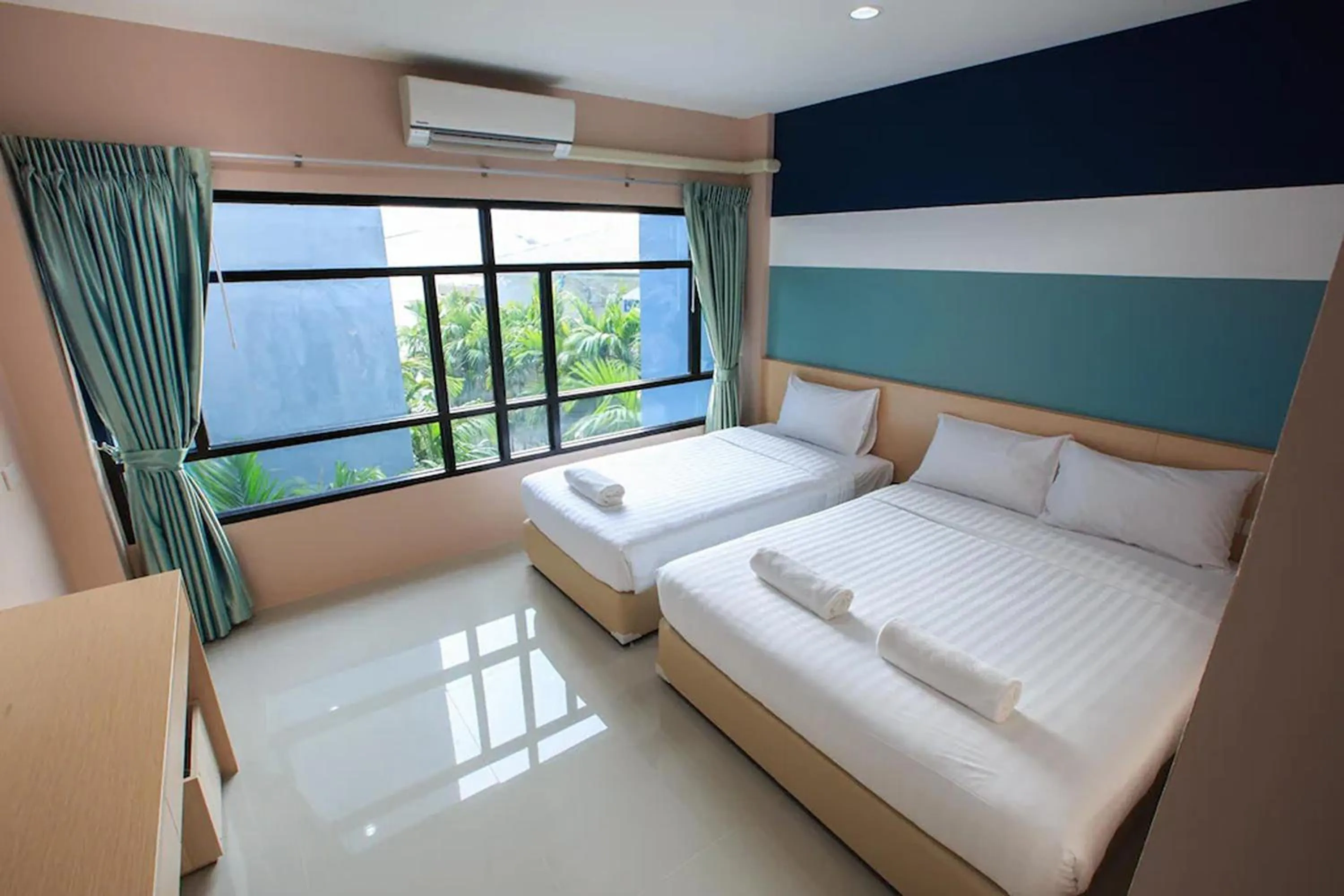 Bed in JJ Residence Phuket Town