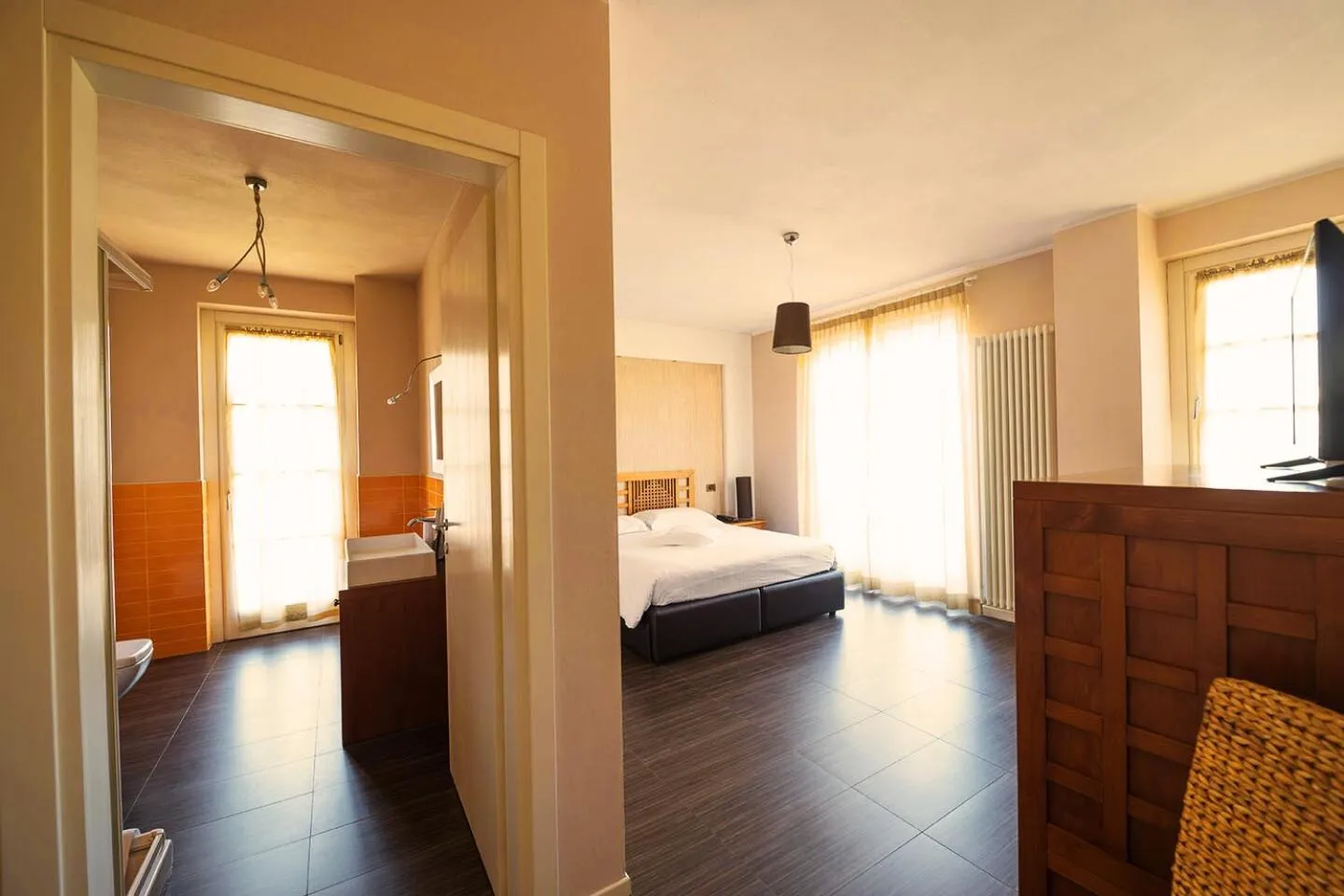 Bed in T'AMI Hotel Resort Spa