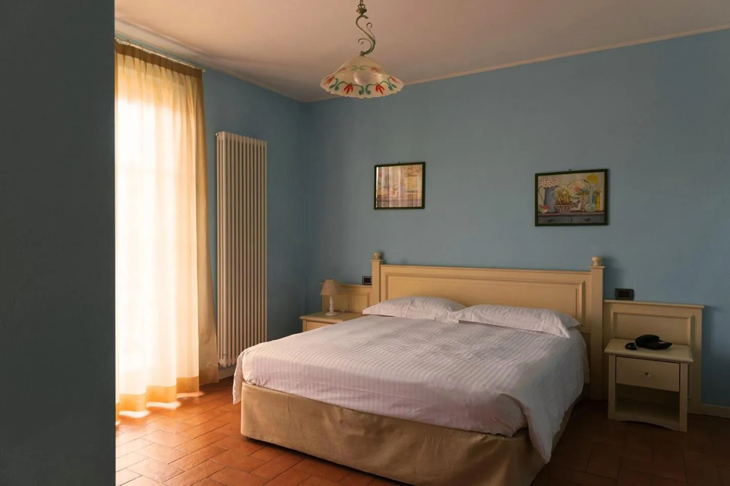 Bed in T'AMI Hotel Resort Spa