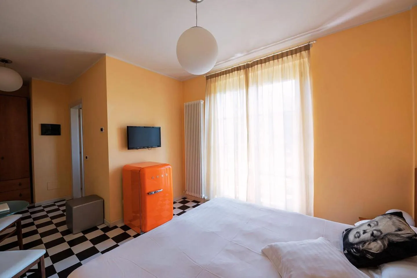 Bed in T'AMI Hotel Resort Spa