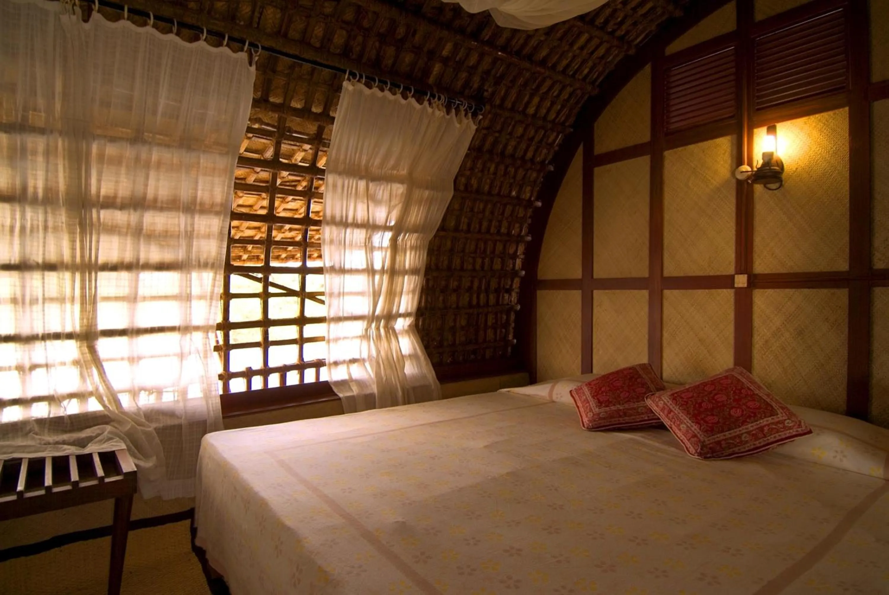 Bed in Spice Coast Cruises - Houseboat, A CGH Earth Experience