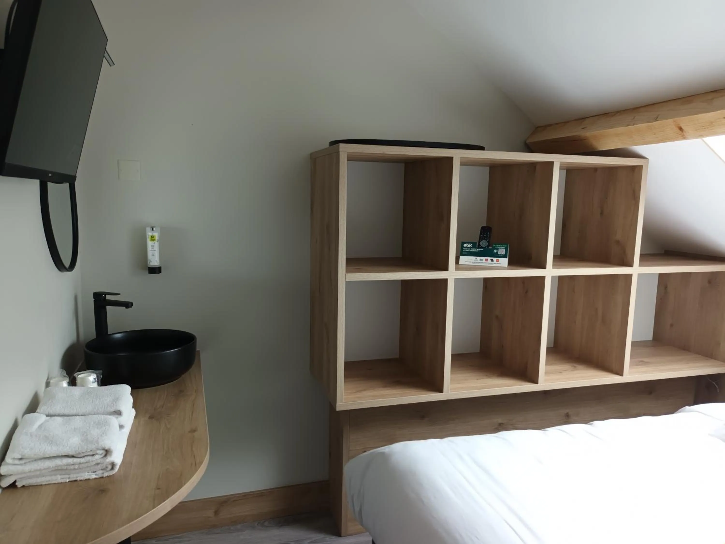 Photo of the whole room, Bed in Hôtel-Restaurant Logis l'Aubrac Laguiole