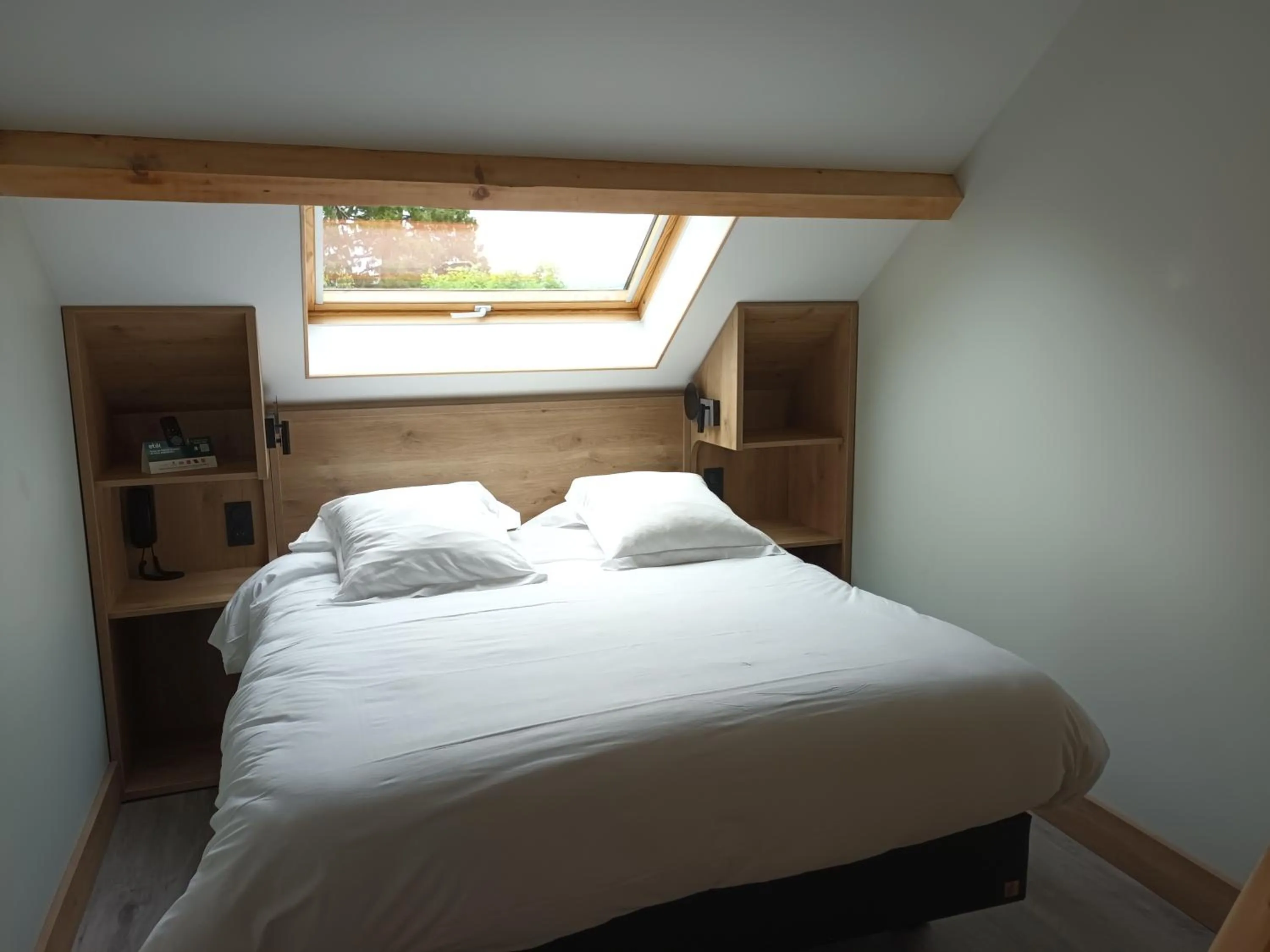 Photo of the whole room, Bed in Hôtel-Restaurant Logis l'Aubrac Laguiole