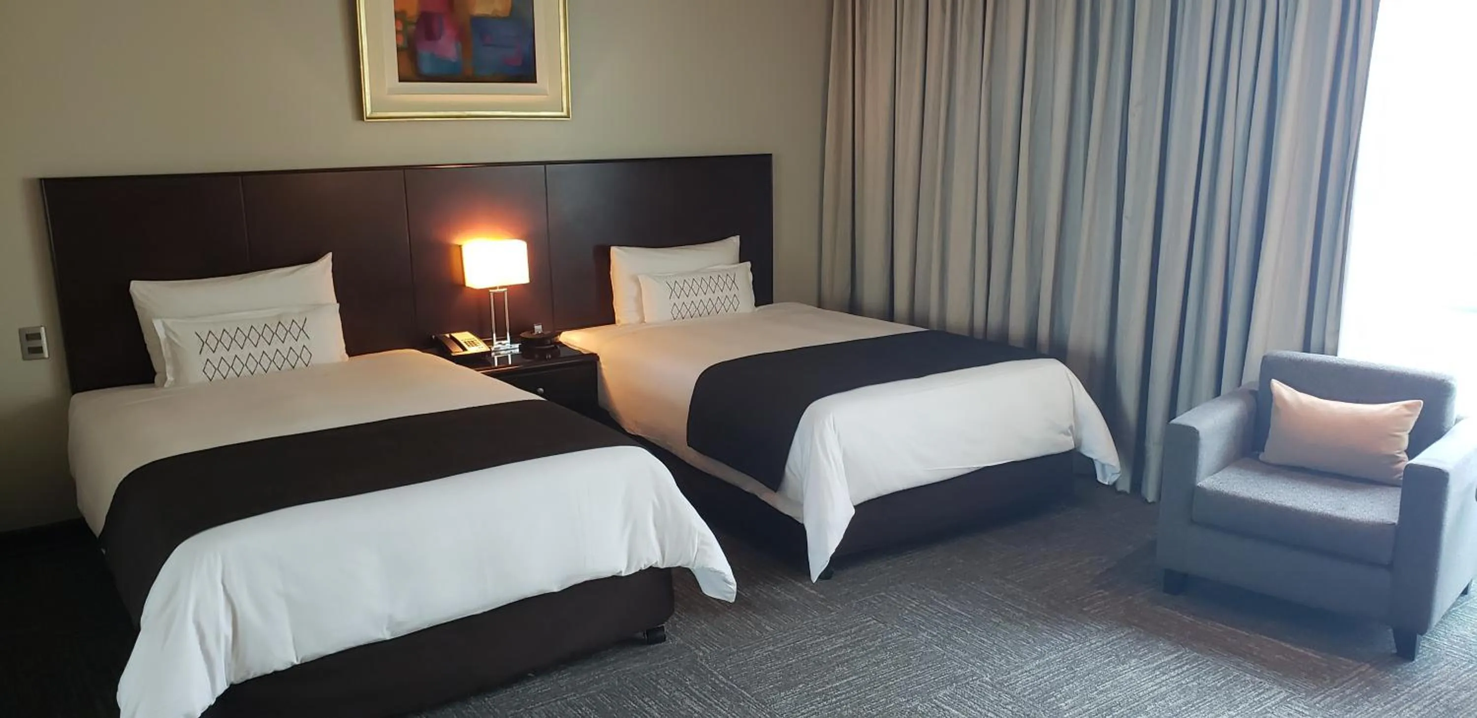 Bed in Delfines Hotel & Convention Center