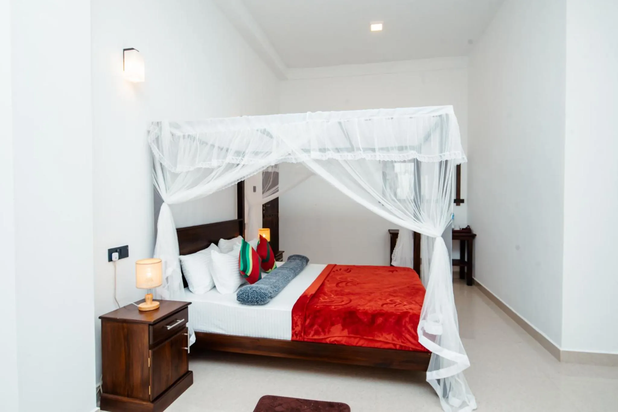 Bed in Adams Peak Inn