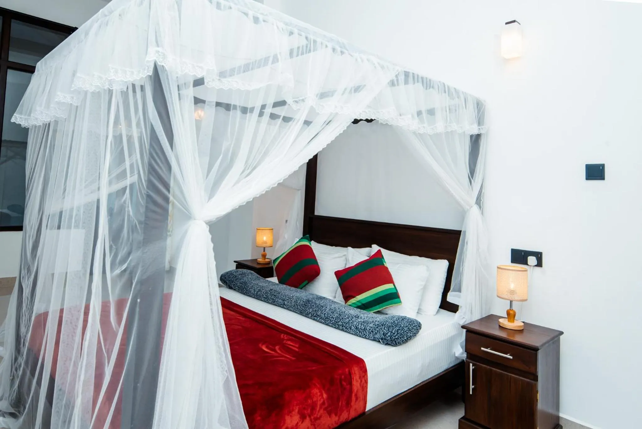Bed in Adams Peak Inn