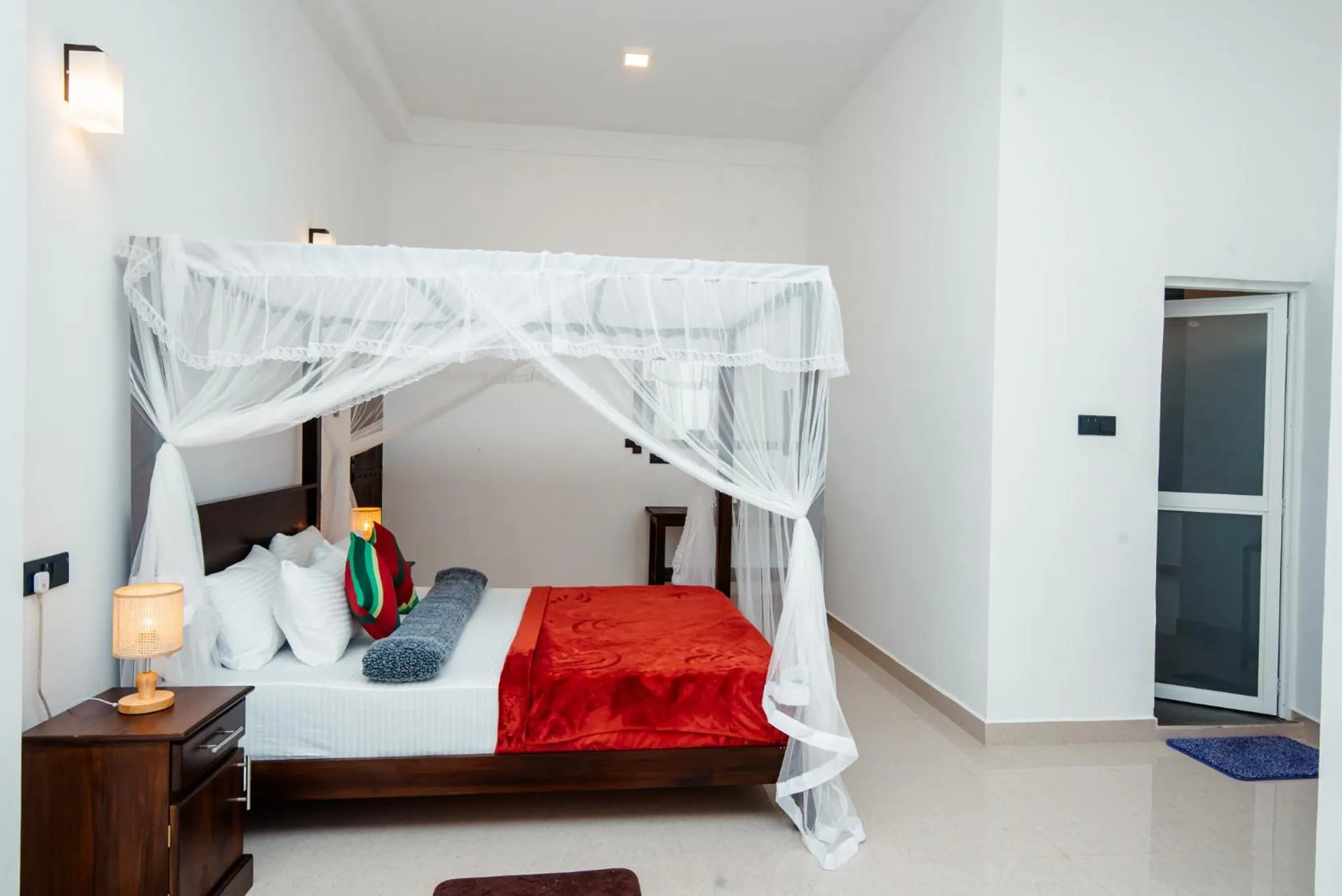 Bed in Adams Peak Inn