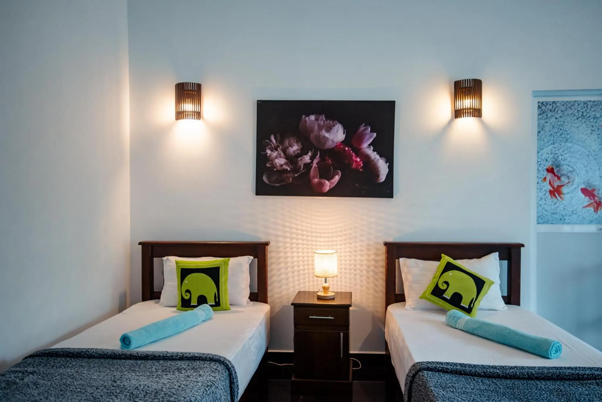 Bed in Adams Peak Inn