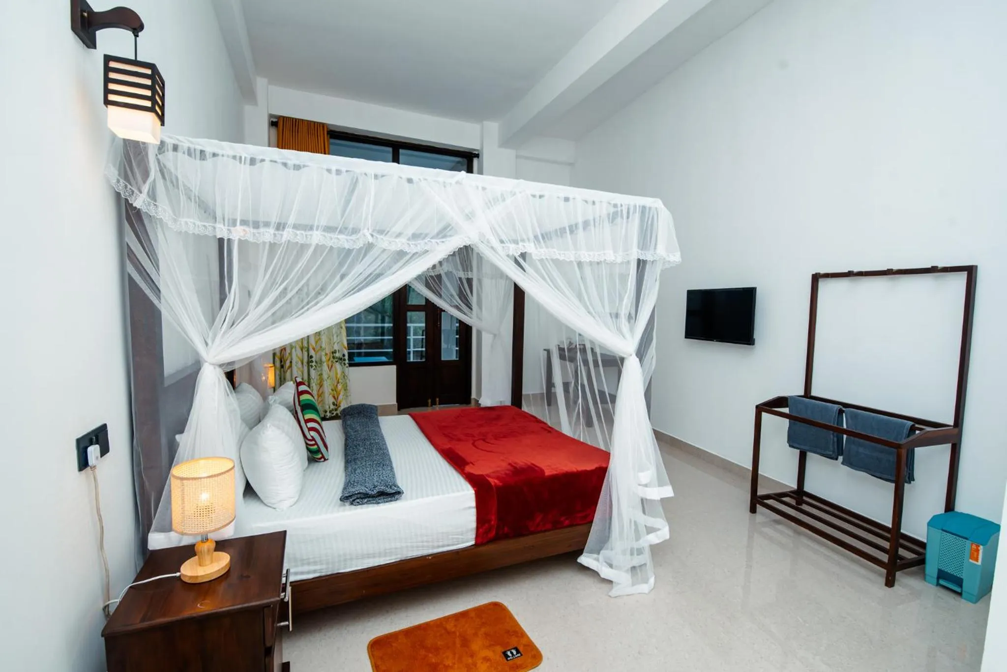 Bed in Adams Peak Inn