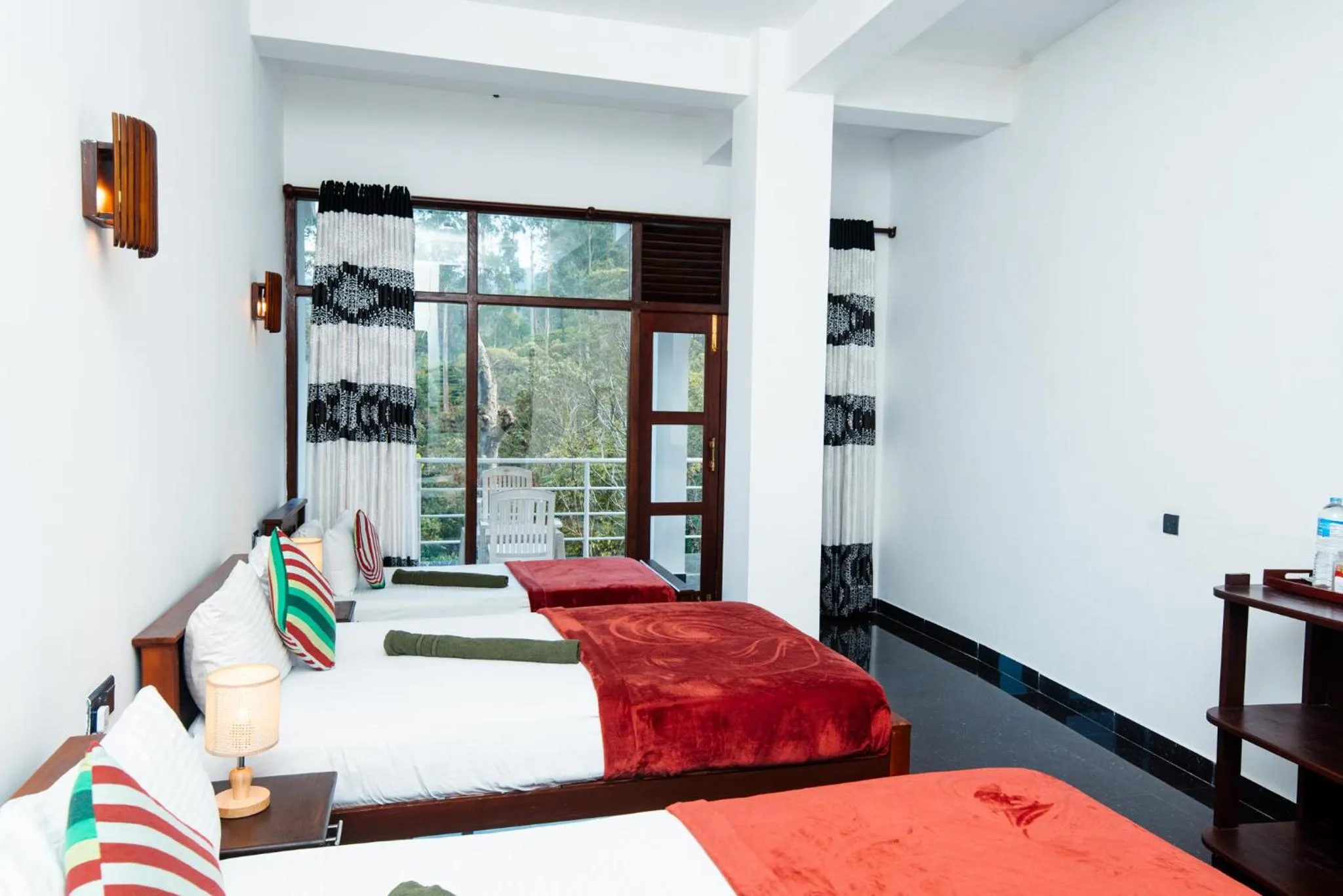 Bed in Adams Peak Inn