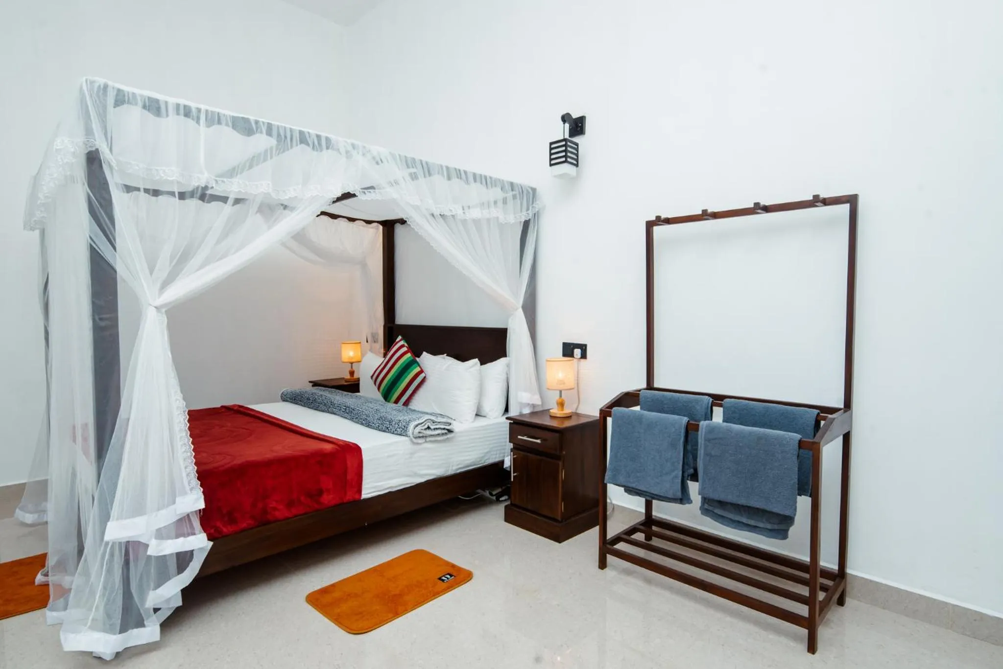 Bed in Adams Peak Inn