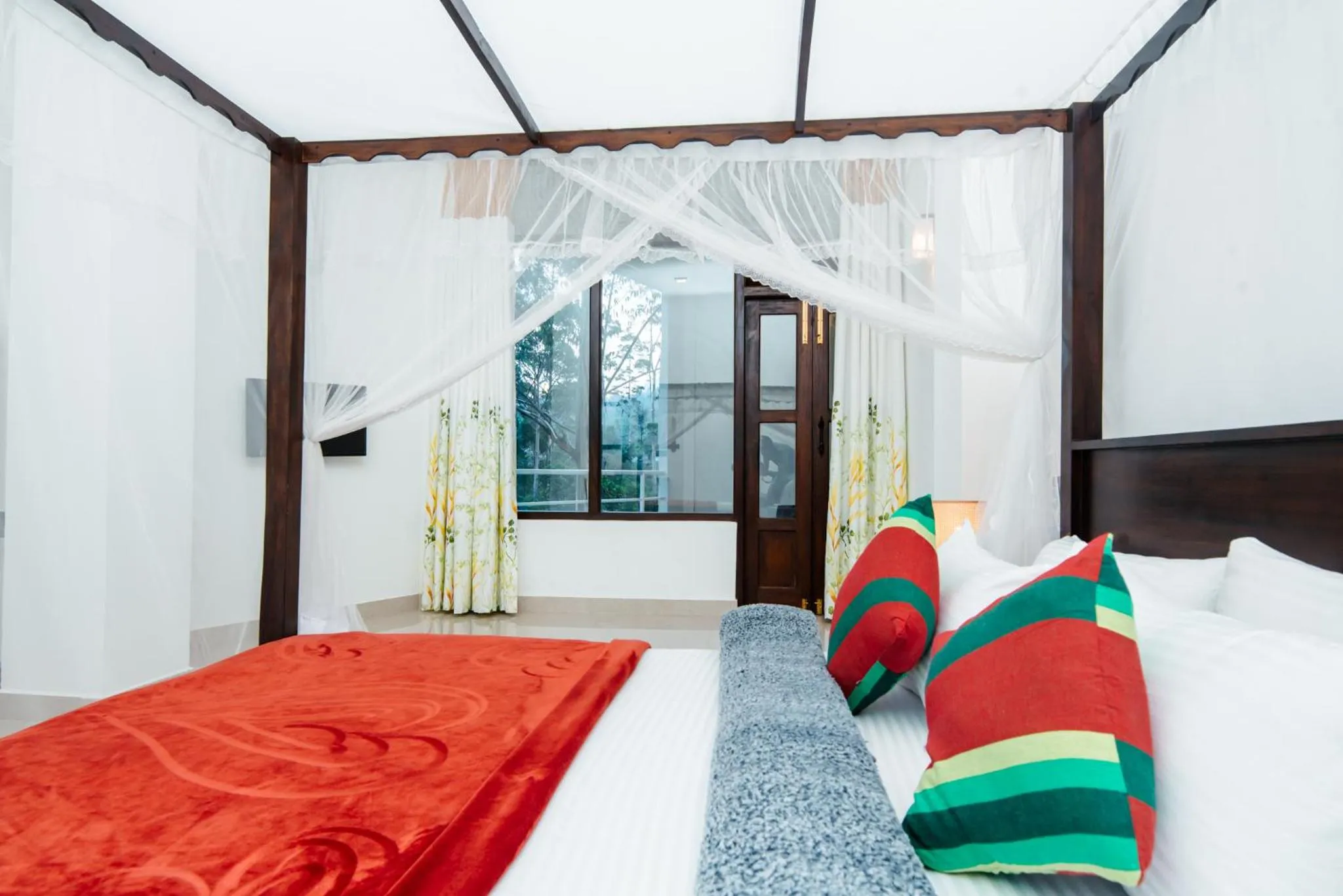 Bed in Adams Peak Inn