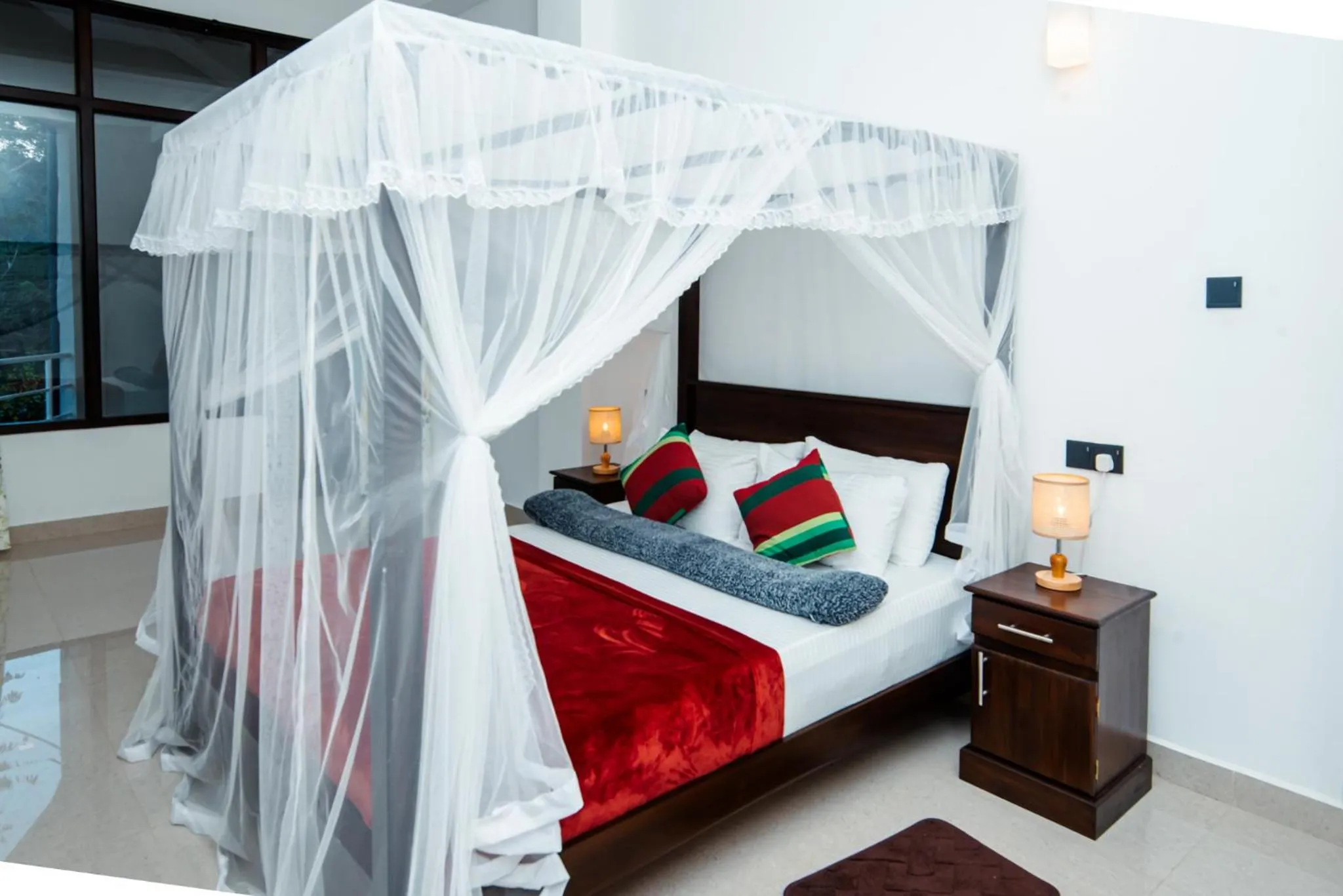 Bed in Adams Peak Inn